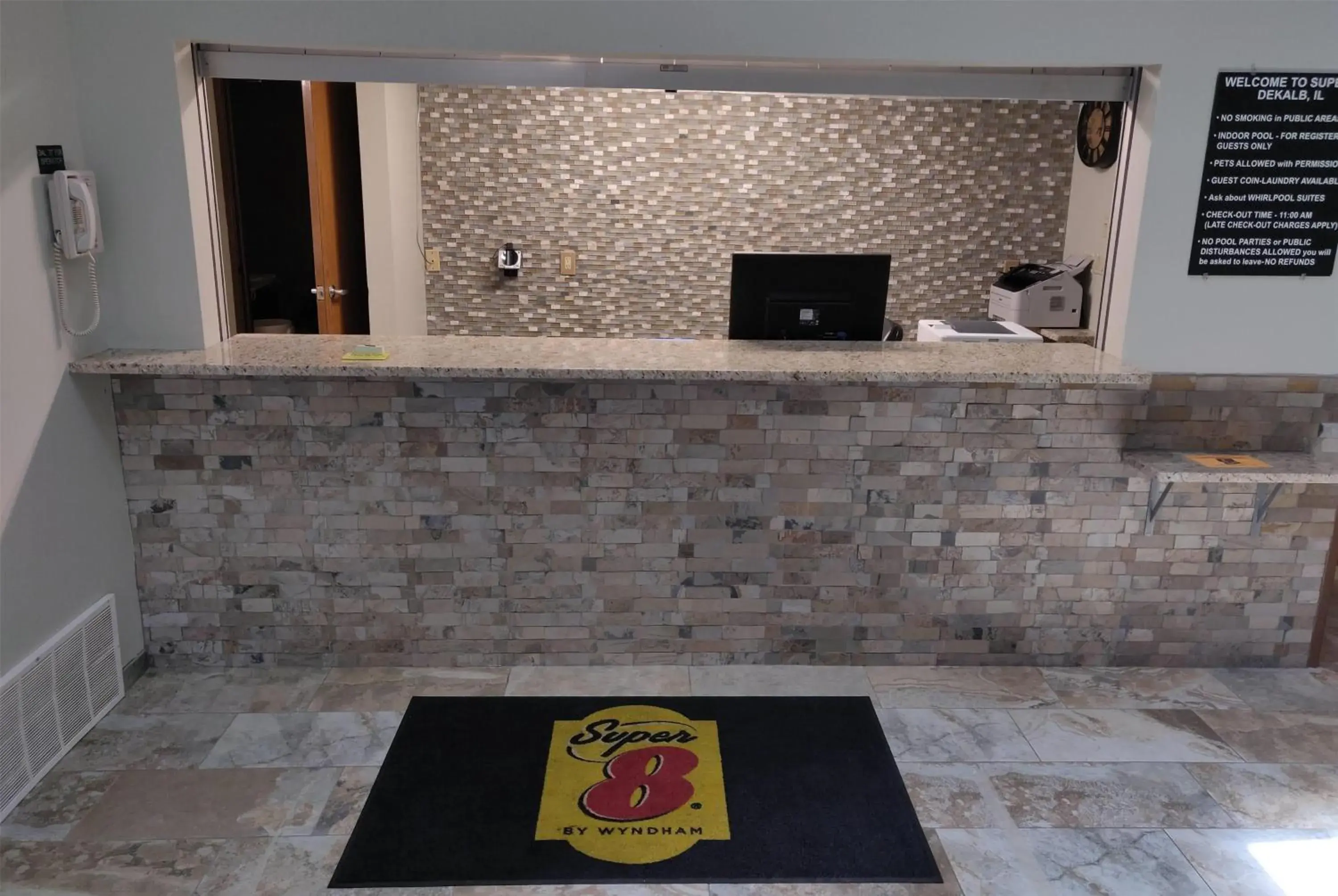 Lobby or reception in Super 8 by Wyndham DeKalb IL Lobby or reception in Super 8 by Wyndham DeKalb IL