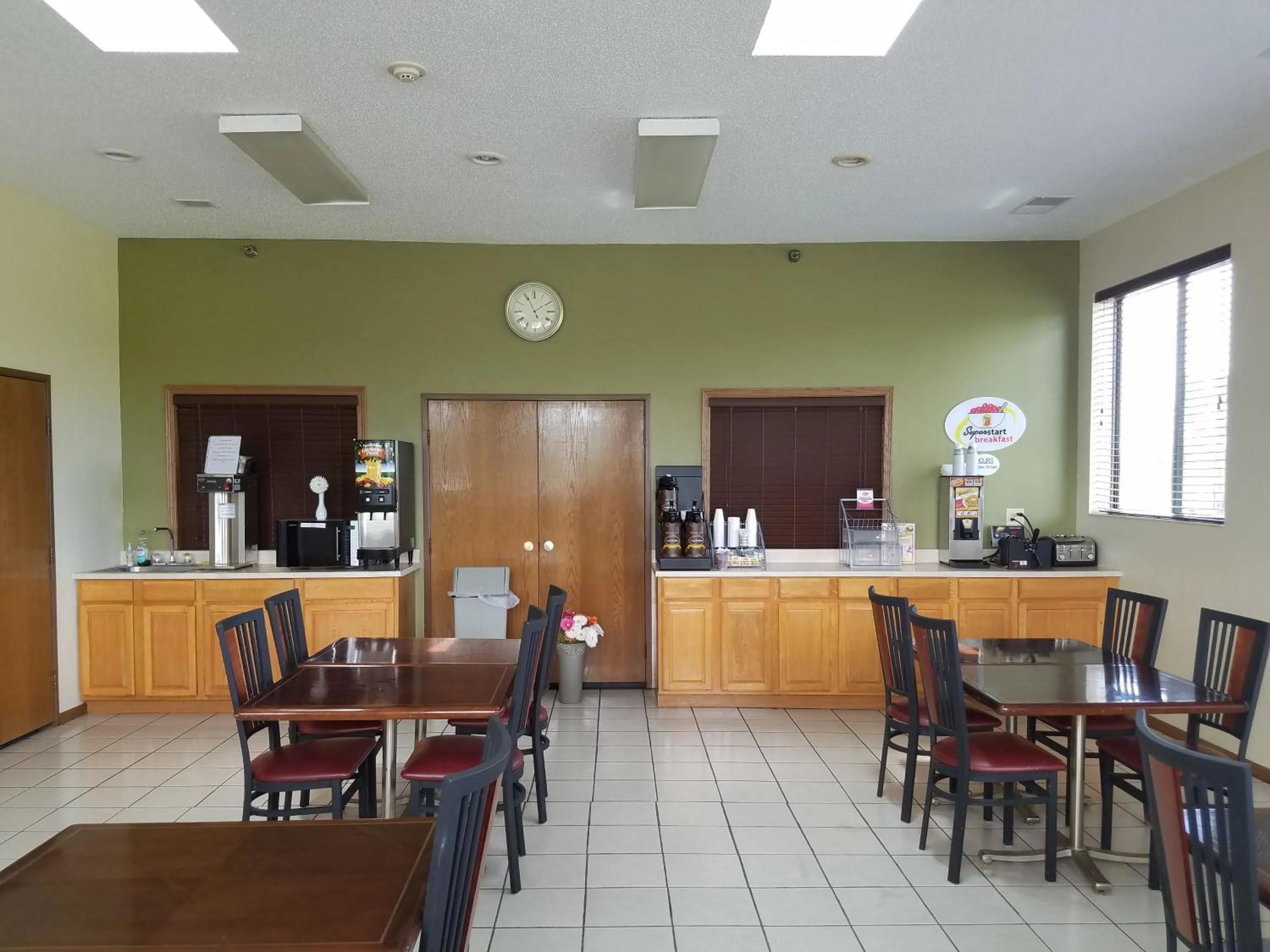 Communal lounge/ TV room in Super 8 by Wyndham DeKalb IL