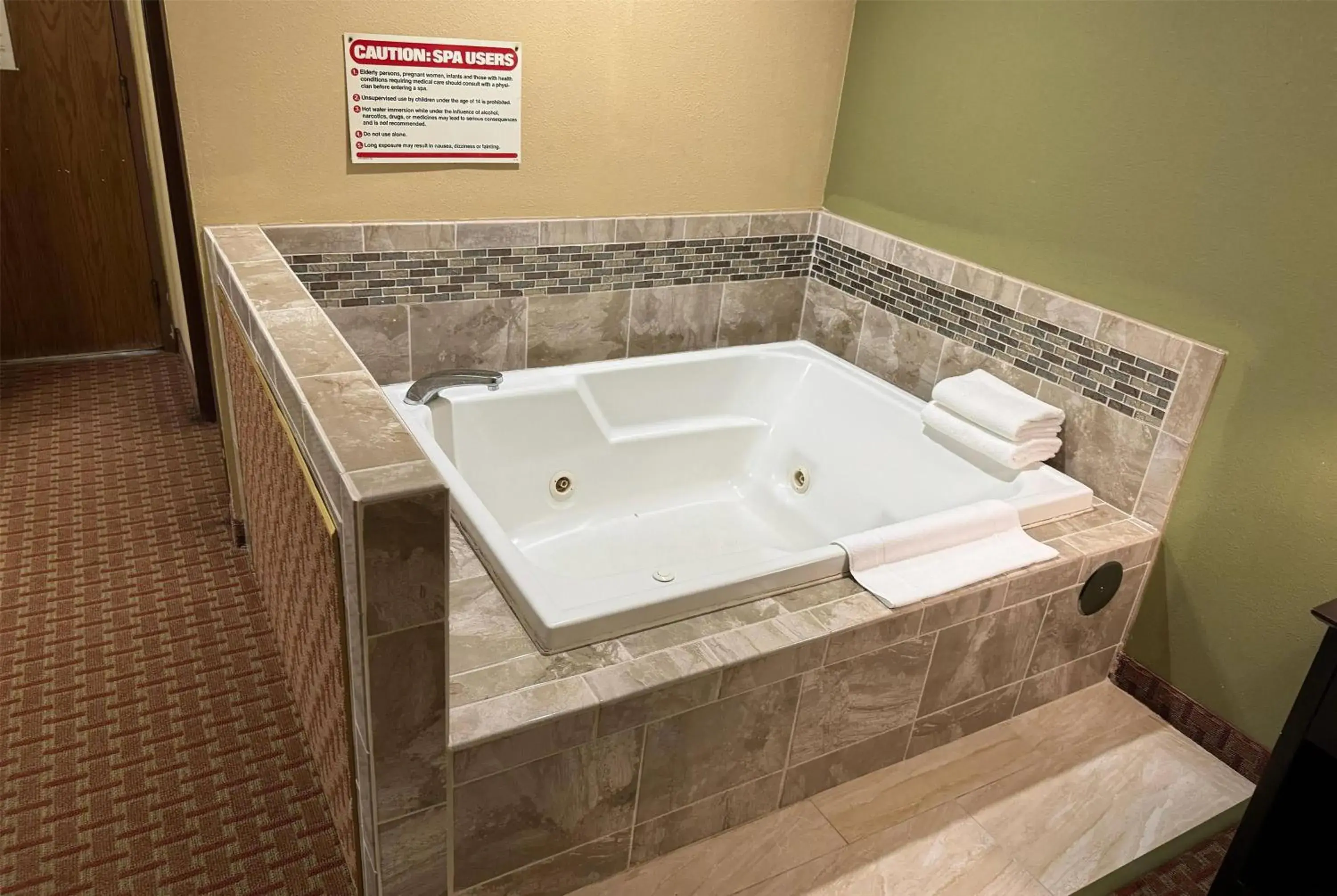 Deluxe King Suite in Super 8 by Wyndham DeKalb IL Deluxe King Suite in Super 8 by Wyndham DeKalb IL