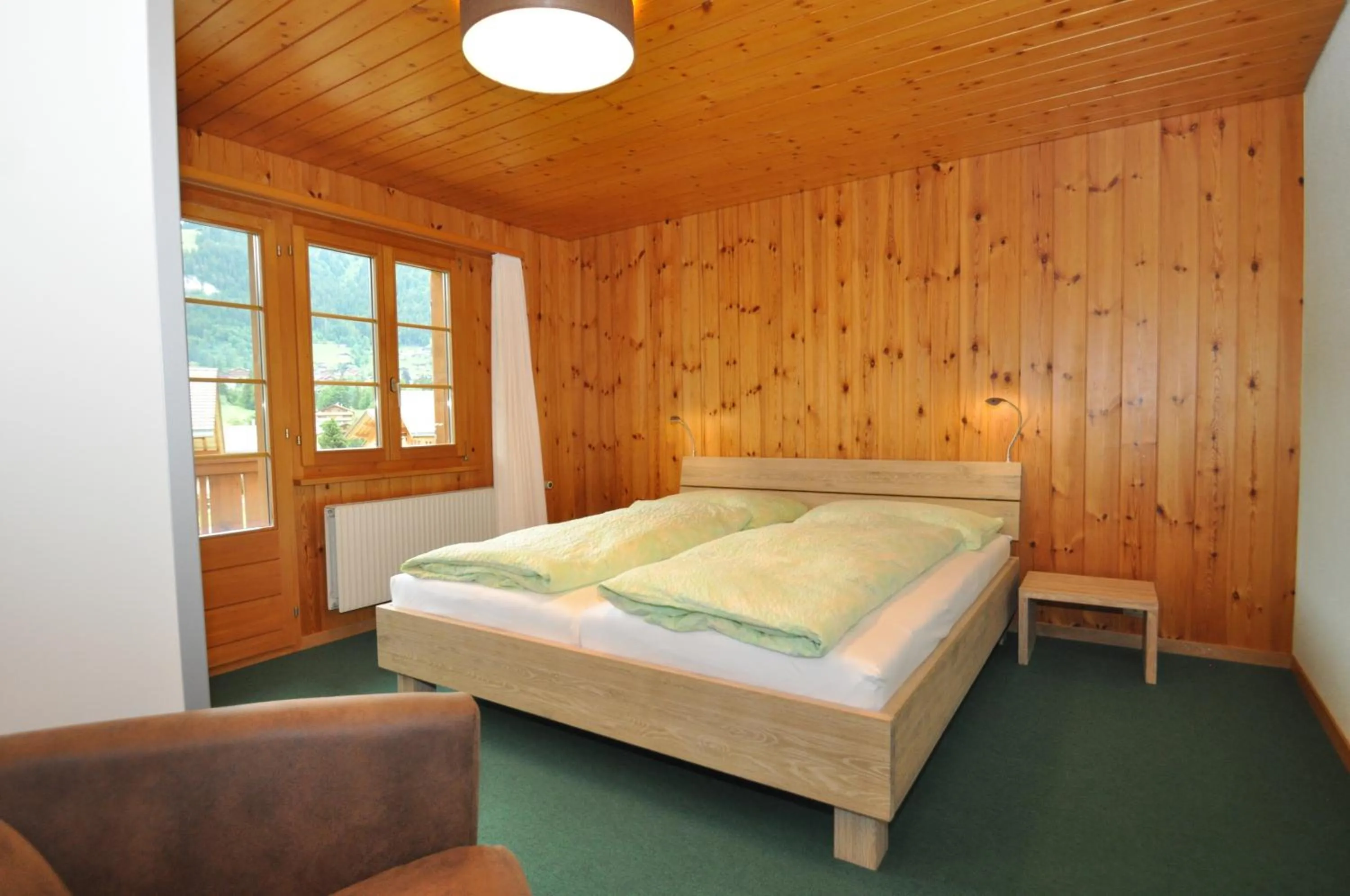 Bedroom, Bed in Ferienwohnungen Hotel Alpina