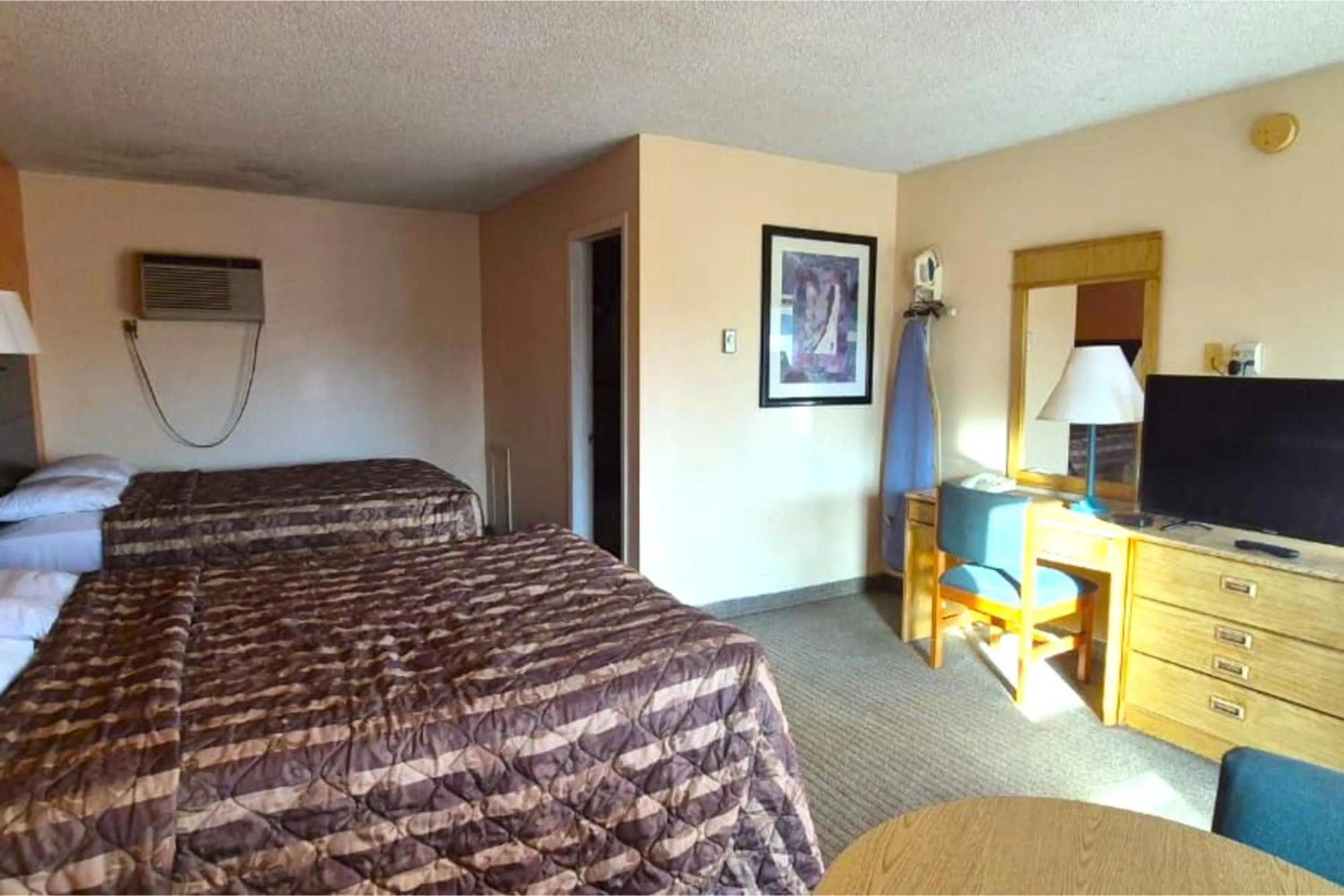 Bedroom, Bed in Canton Inn By OYO