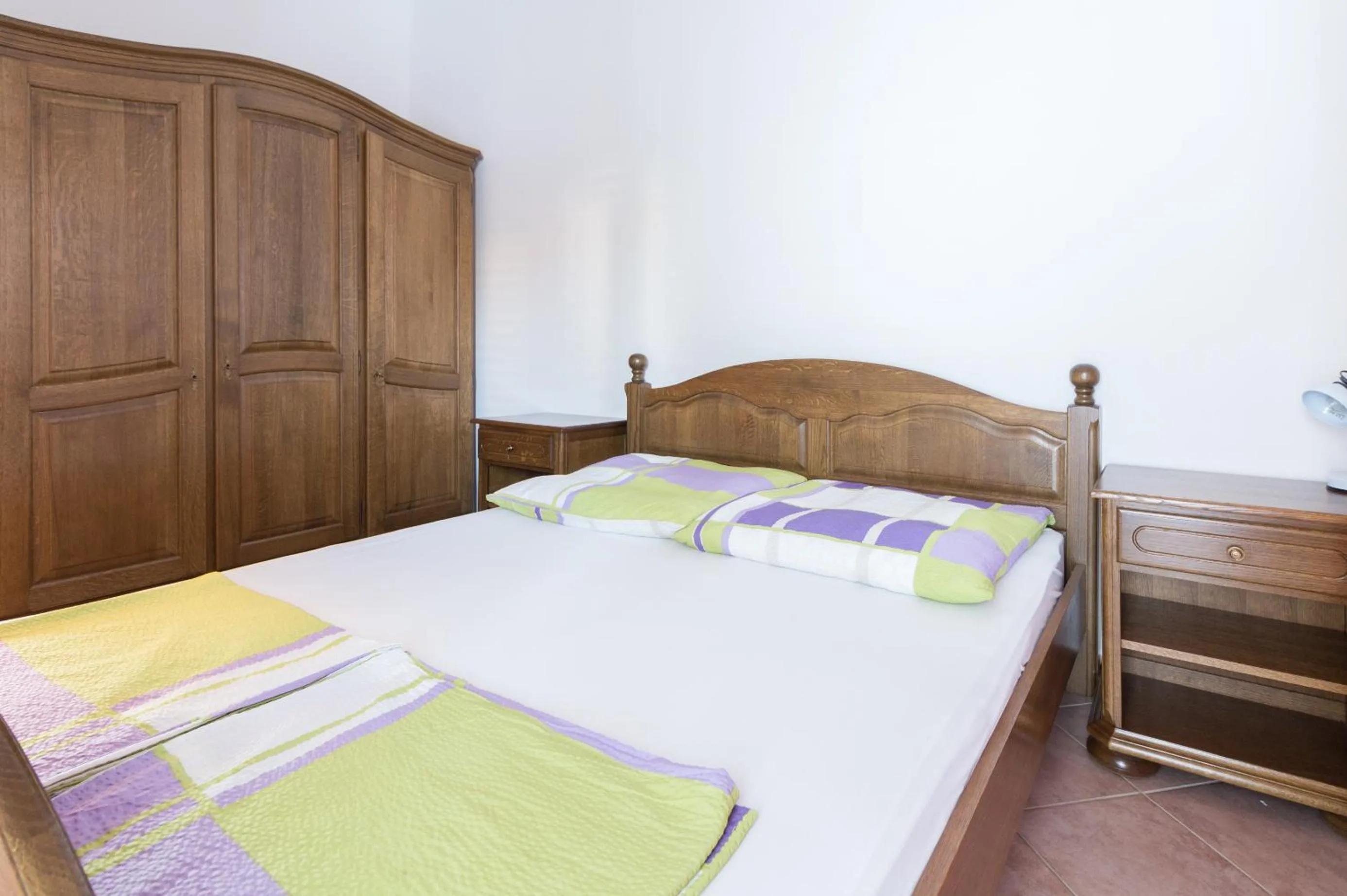 Bed in Apartments Sunset near the sandy beach - by TA Leut Agency