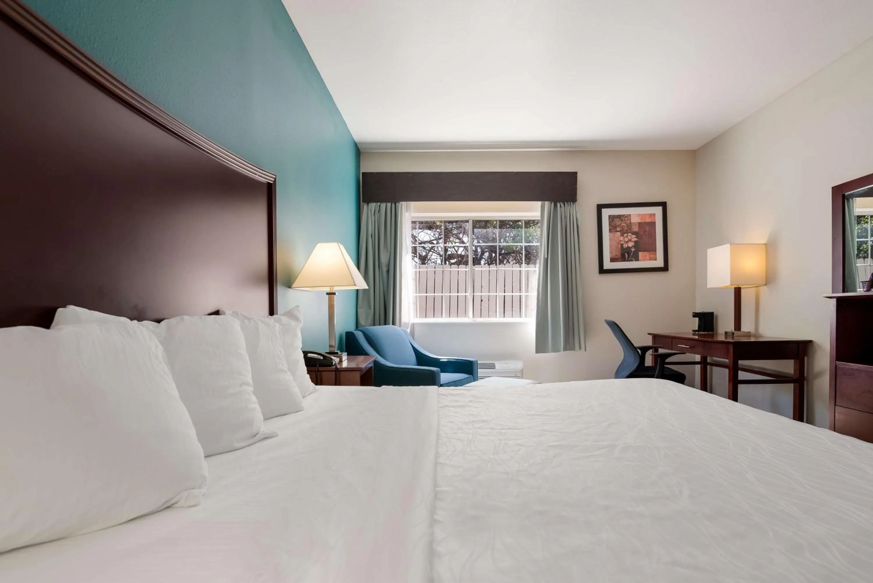 Bedroom, Bed in SureStay Plus Hotel by Best Western Topeka