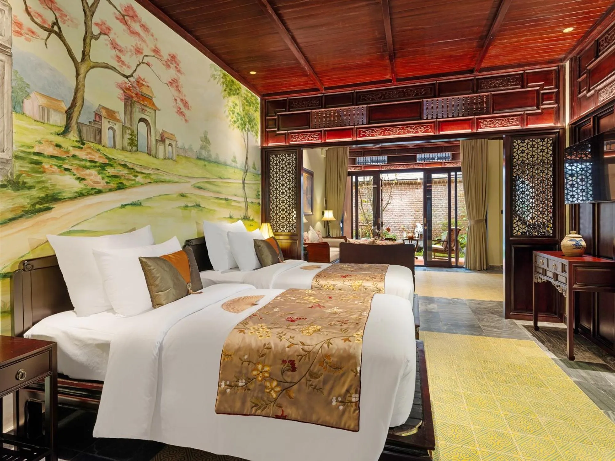 Communal lounge/ TV room, Bed in Ancient Huế Garden Houses