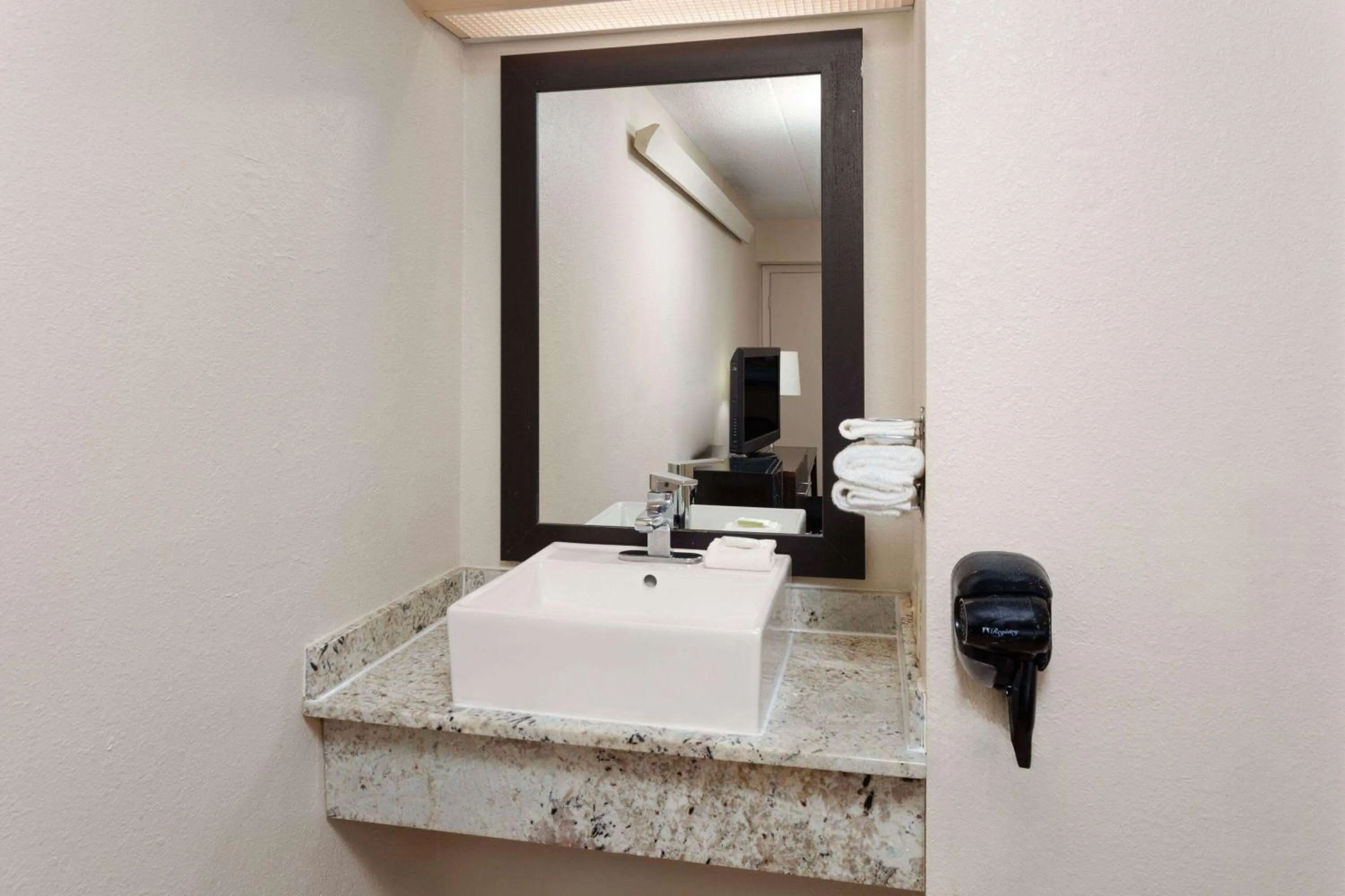 Bathroom in Travelodge by Wyndham Peoria