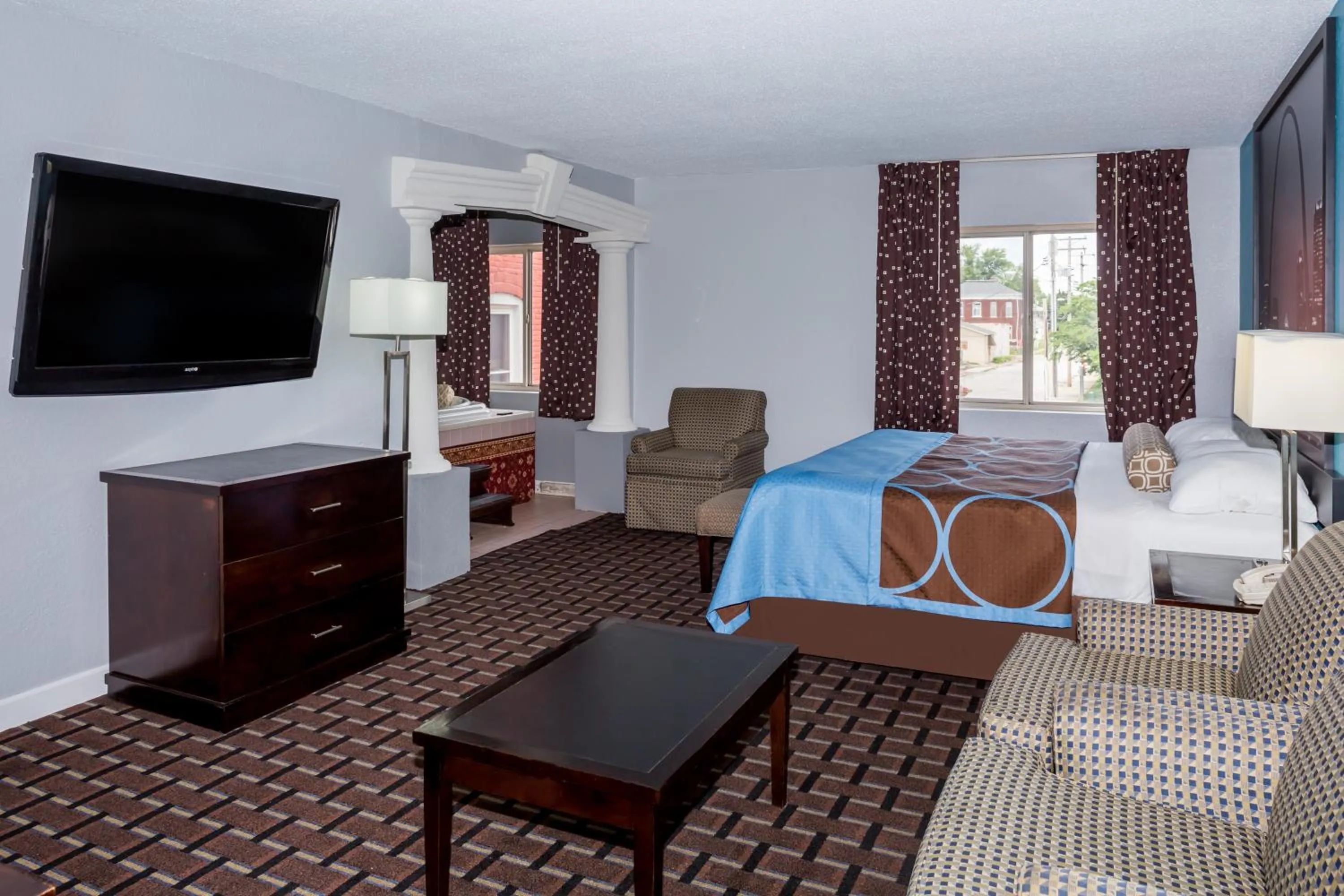 Bed in Super 8 by Wyndham Belleville St. Louis Area