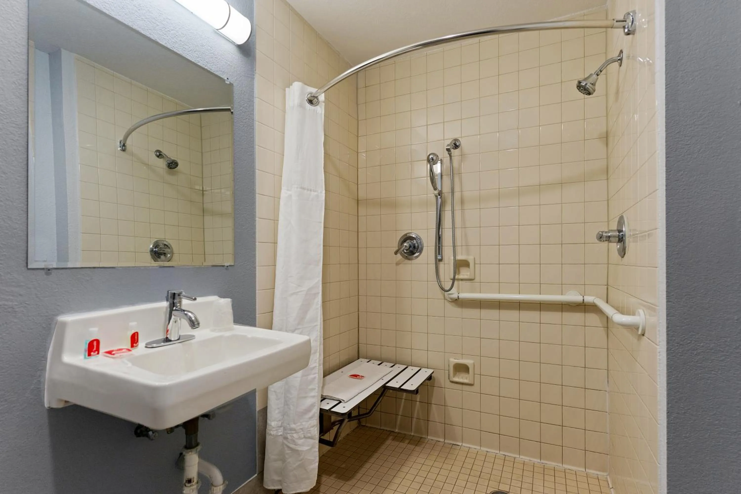 Bathroom in SureStay Hotel by Best Western Rockford East