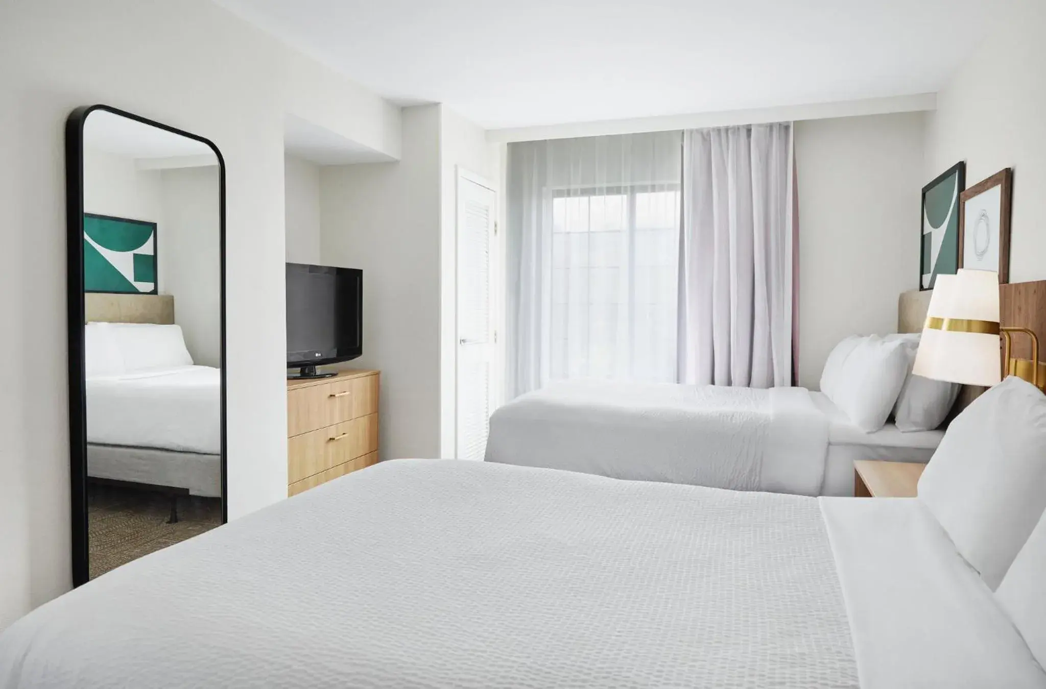 Photo of the whole room, Bed in Staybridge Suites Peoria Downtown by IHG Photo of the whole room, Bed in Staybridge Suites Peoria Downtown by IHG