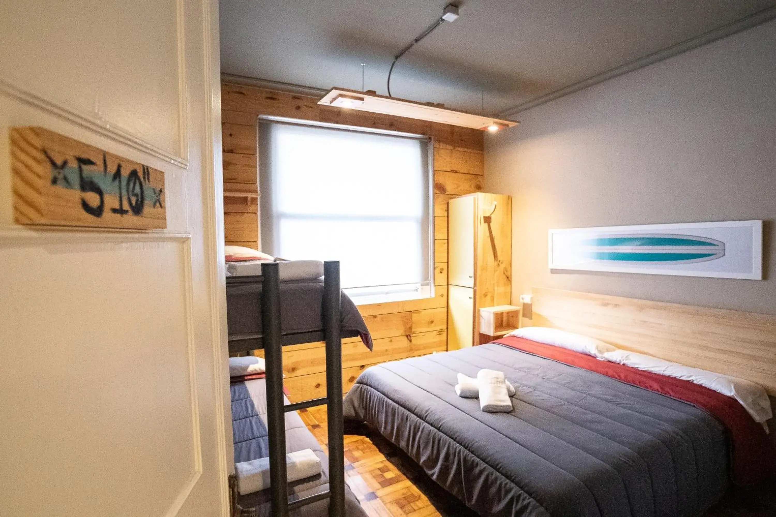 Quadruple Room with Private External Bathroom in Carving Surf Hostel Quadruple Room with Private External Bathroom in Carving Surf Hostel