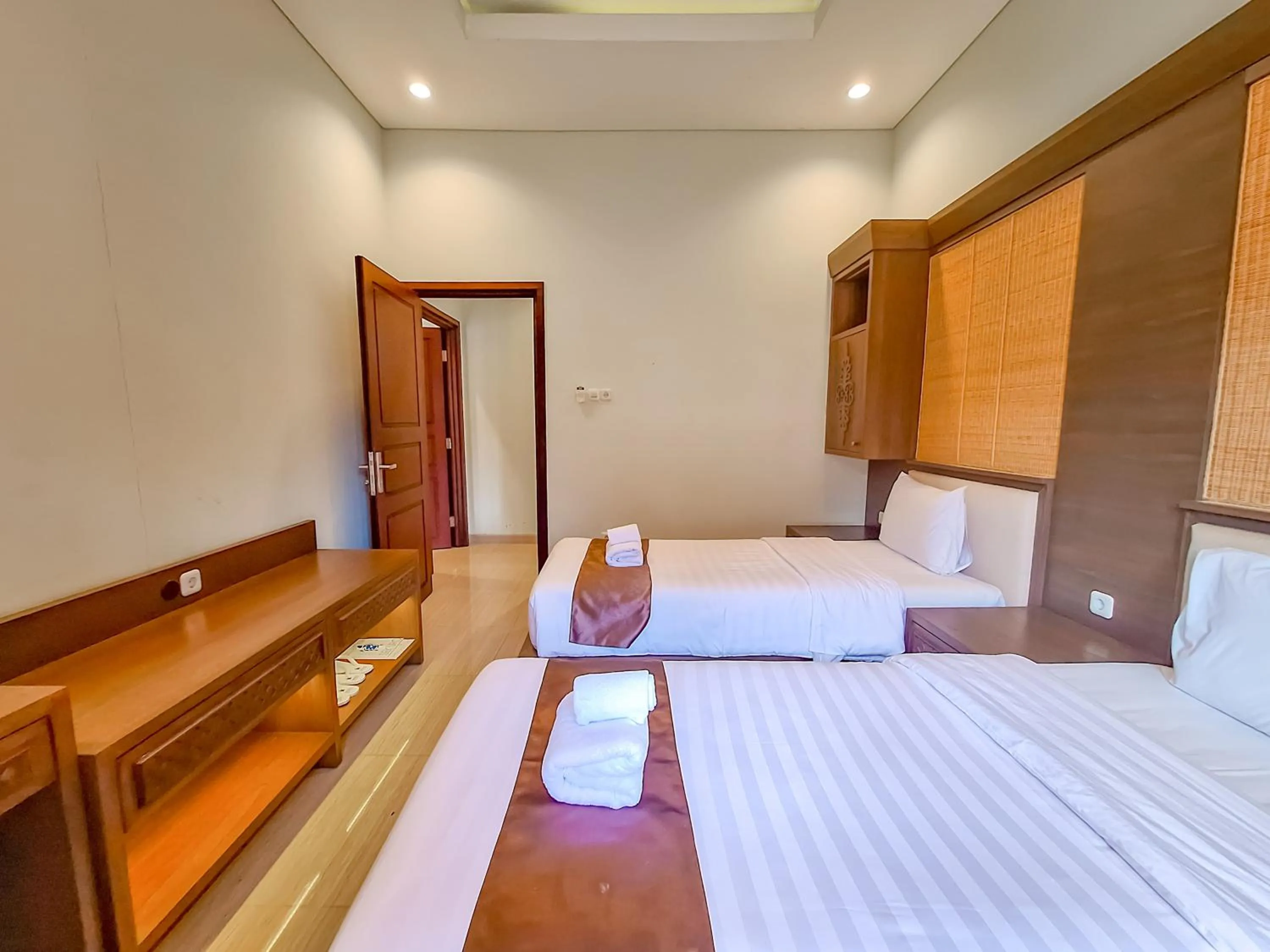 Bed in Sekuro Village Beach Resort