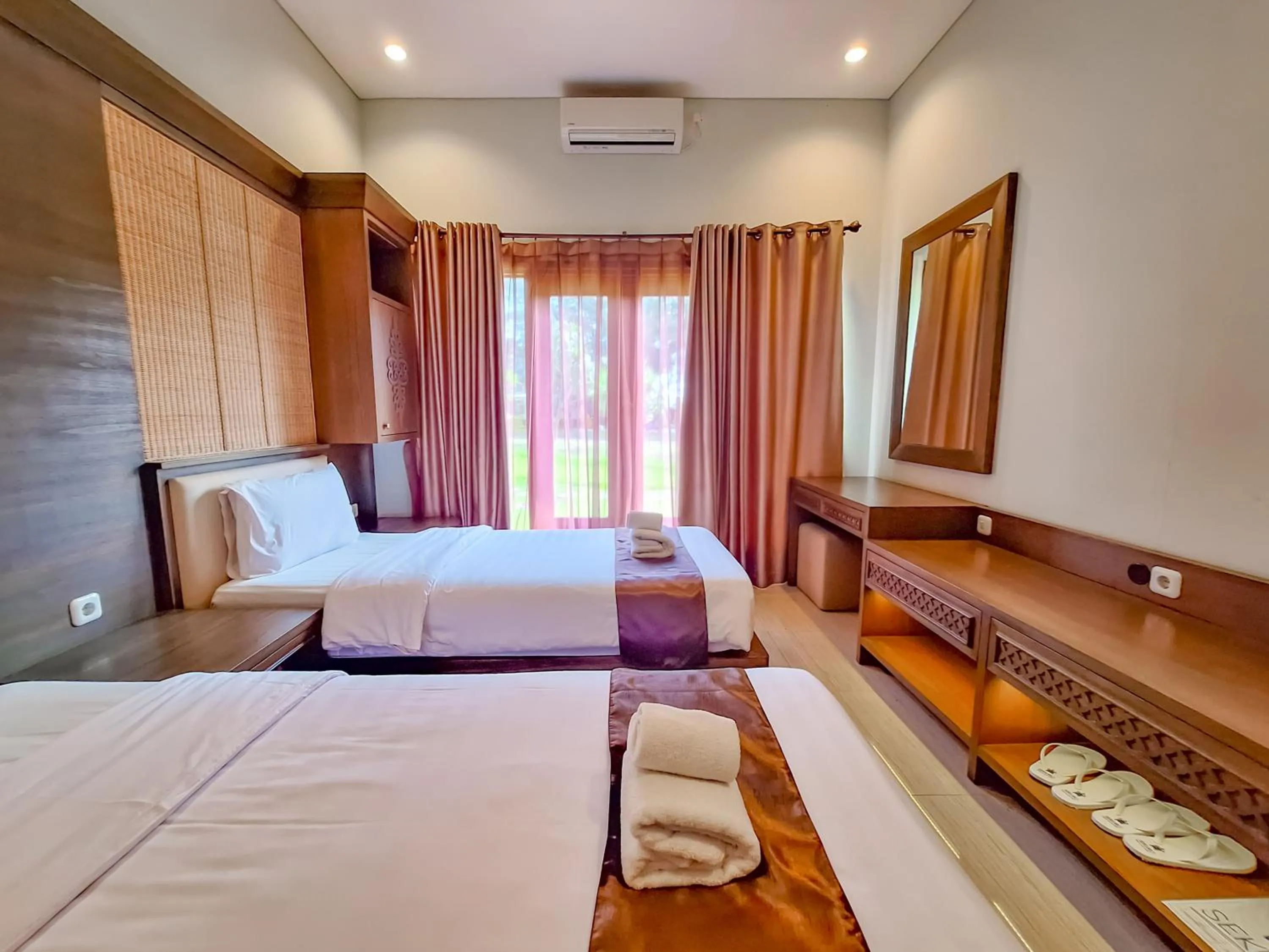 Bed in Sekuro Village Beach Resort