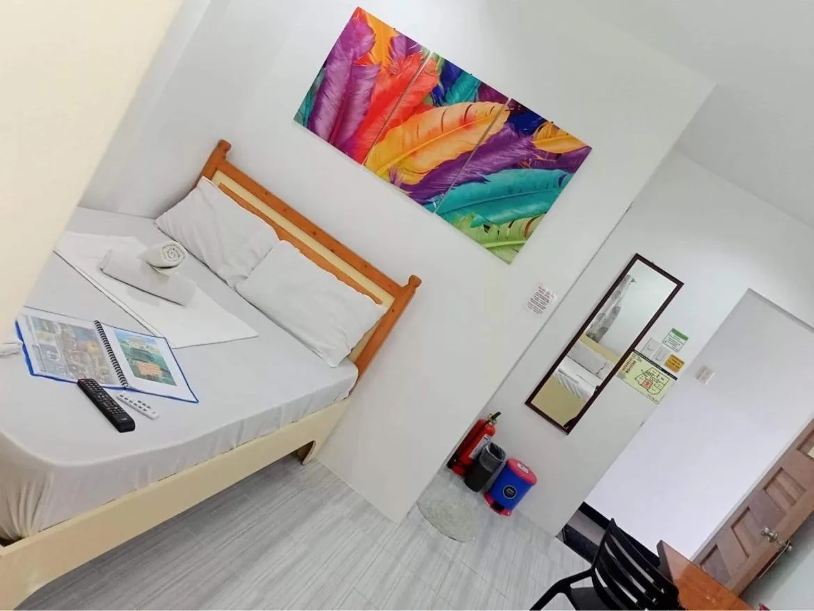 Bed in Cool Stay Inn