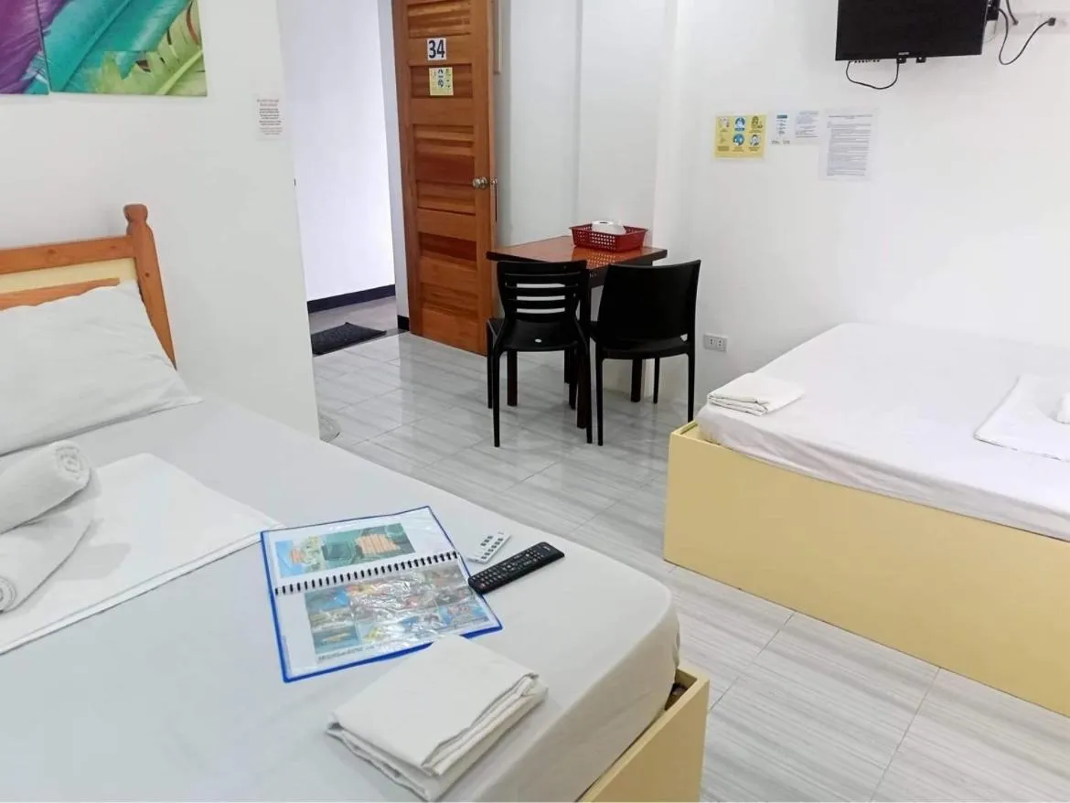 Bed in Cool Stay Inn