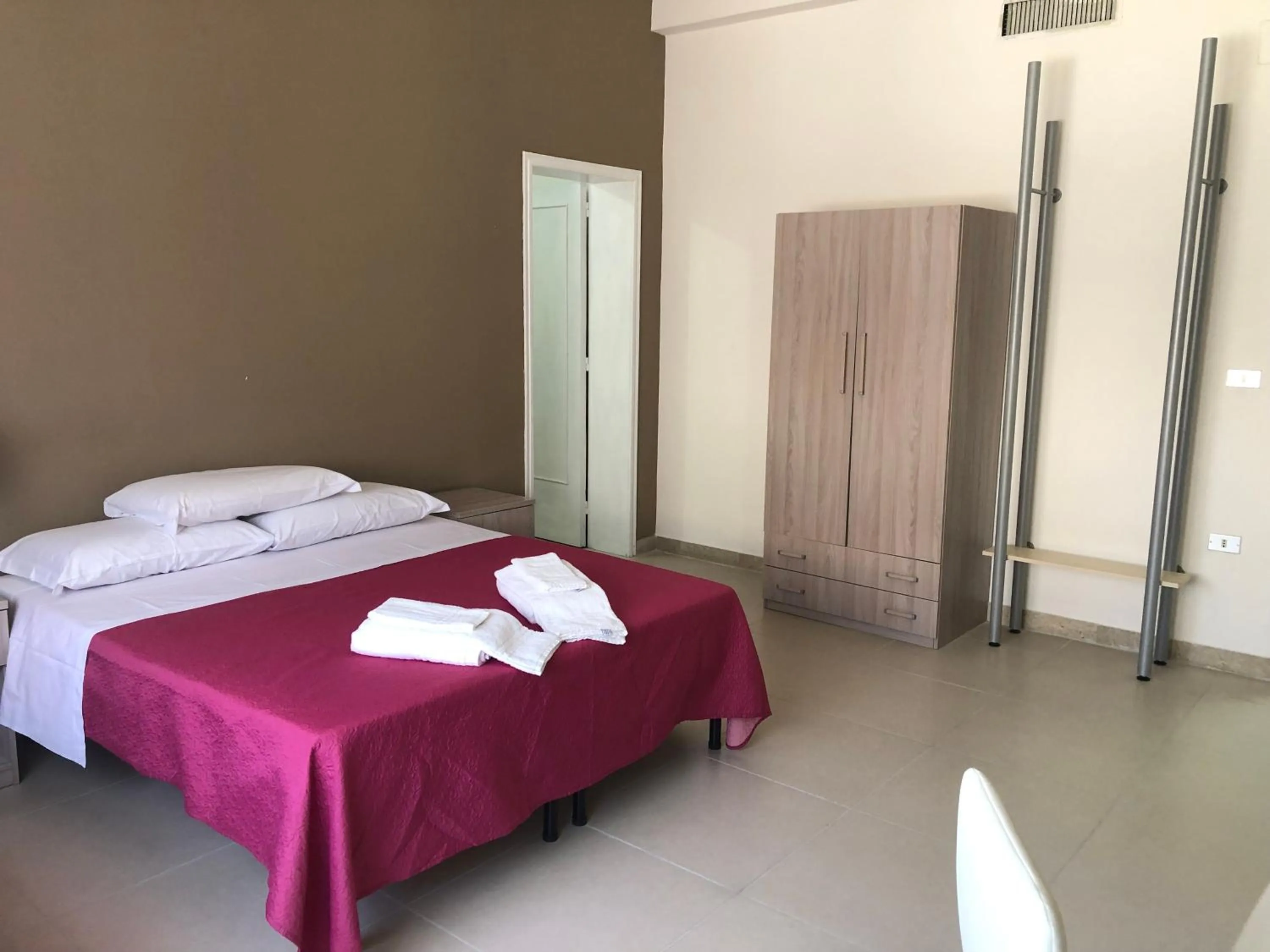 Bed in MAGNA GRECIA B&B