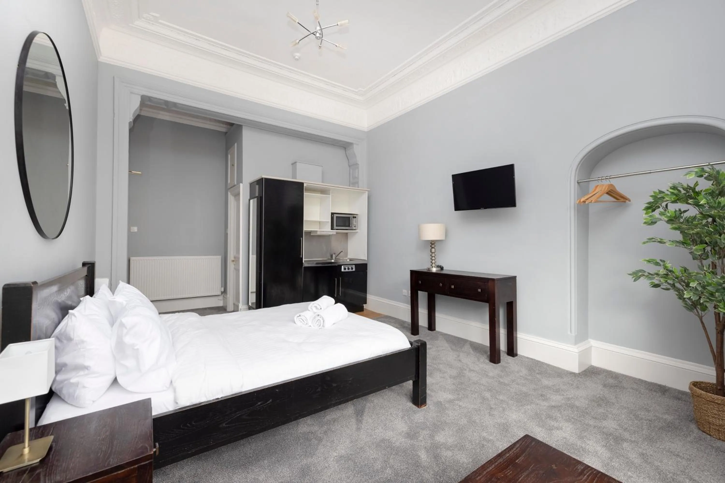 Communal lounge/ TV room, Bed in JOIVY Haymarket