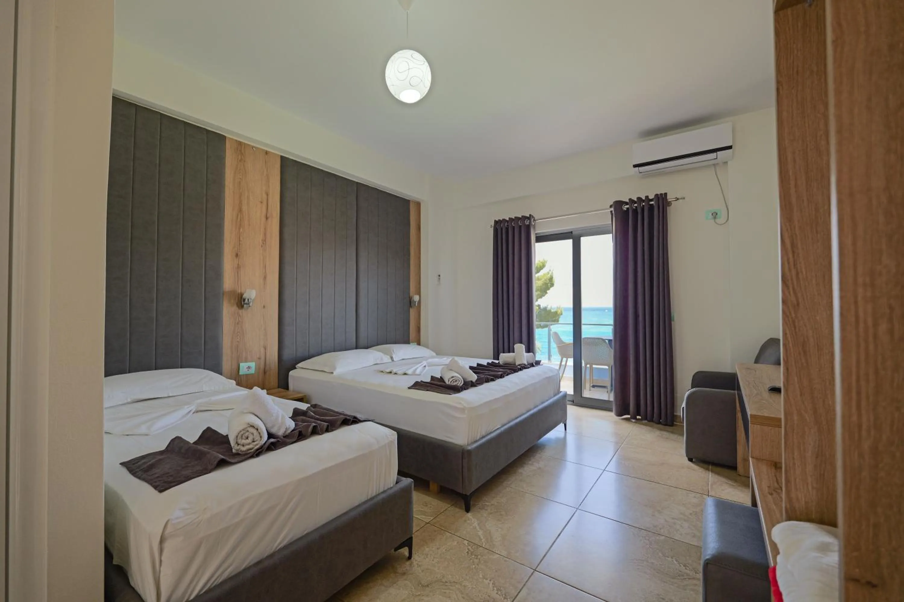 Photo of the whole room, Bed in Hotel Esmerald Ksamil