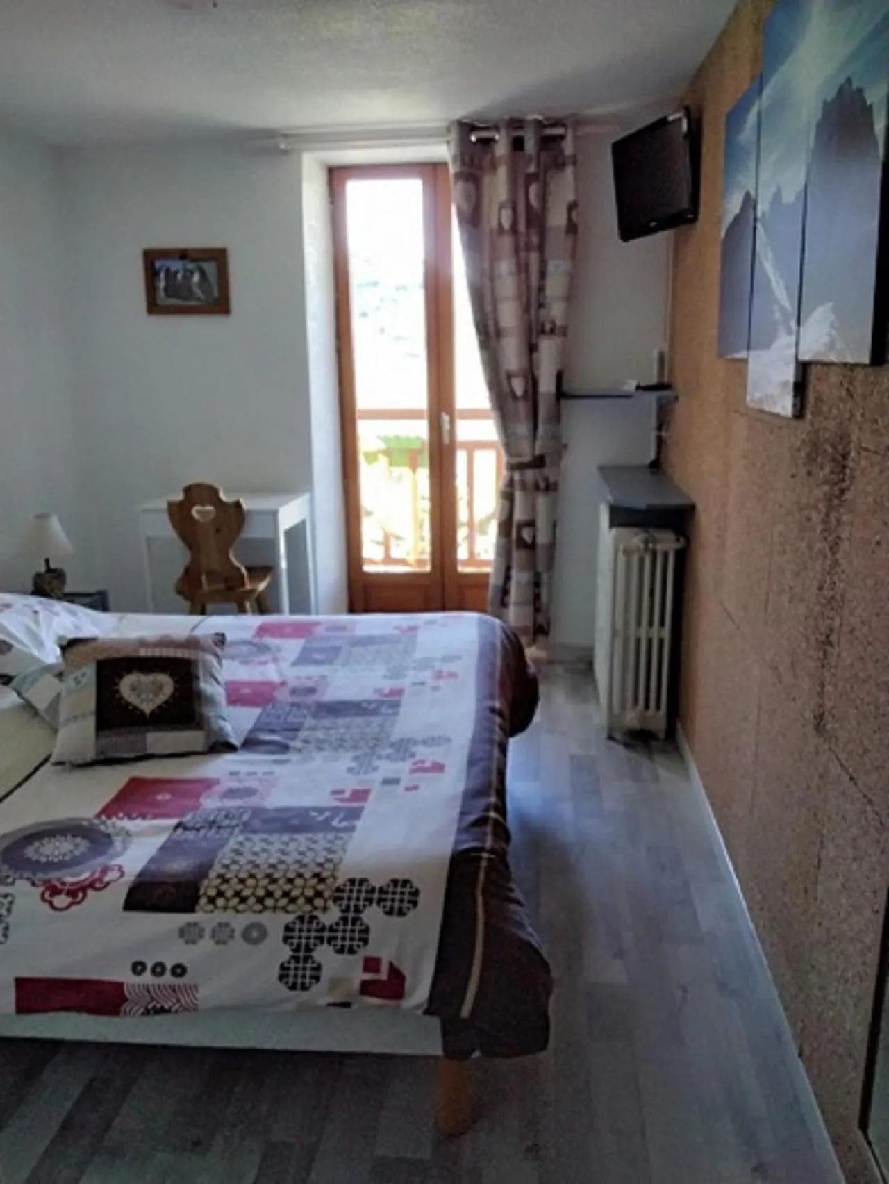 Bedroom in Hôtel Le Beauséjour