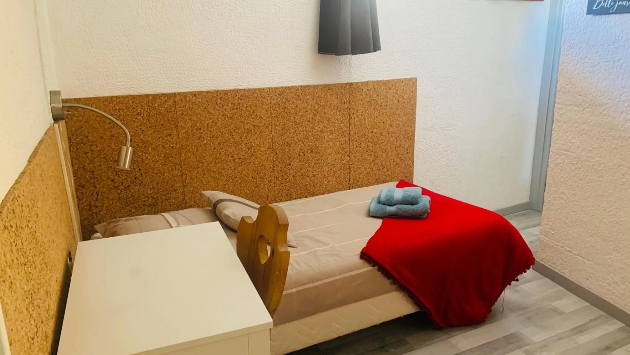 Bed in Hôtel Le Beauséjour