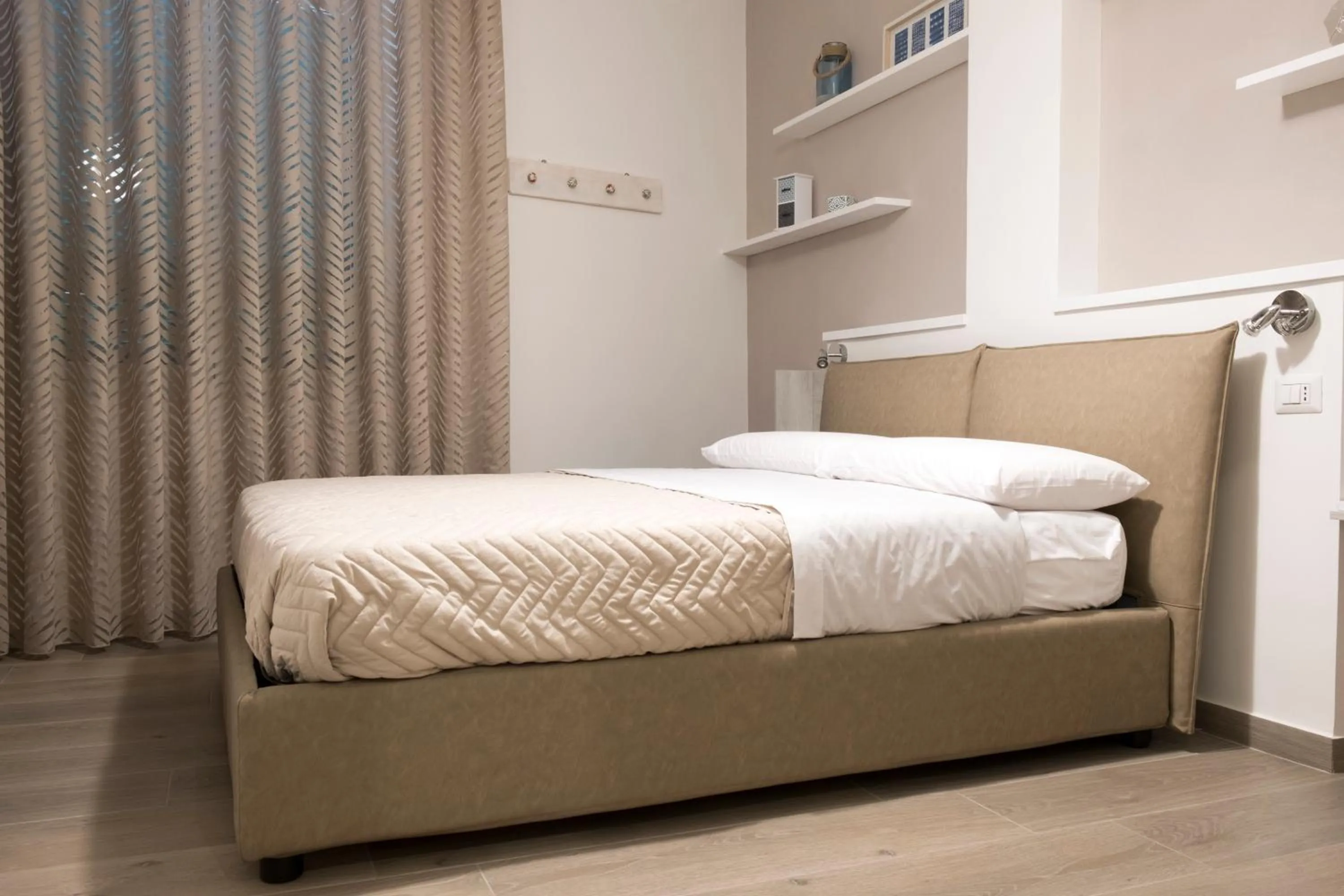 Bed in DIMORA FLEGREA room & breakfast