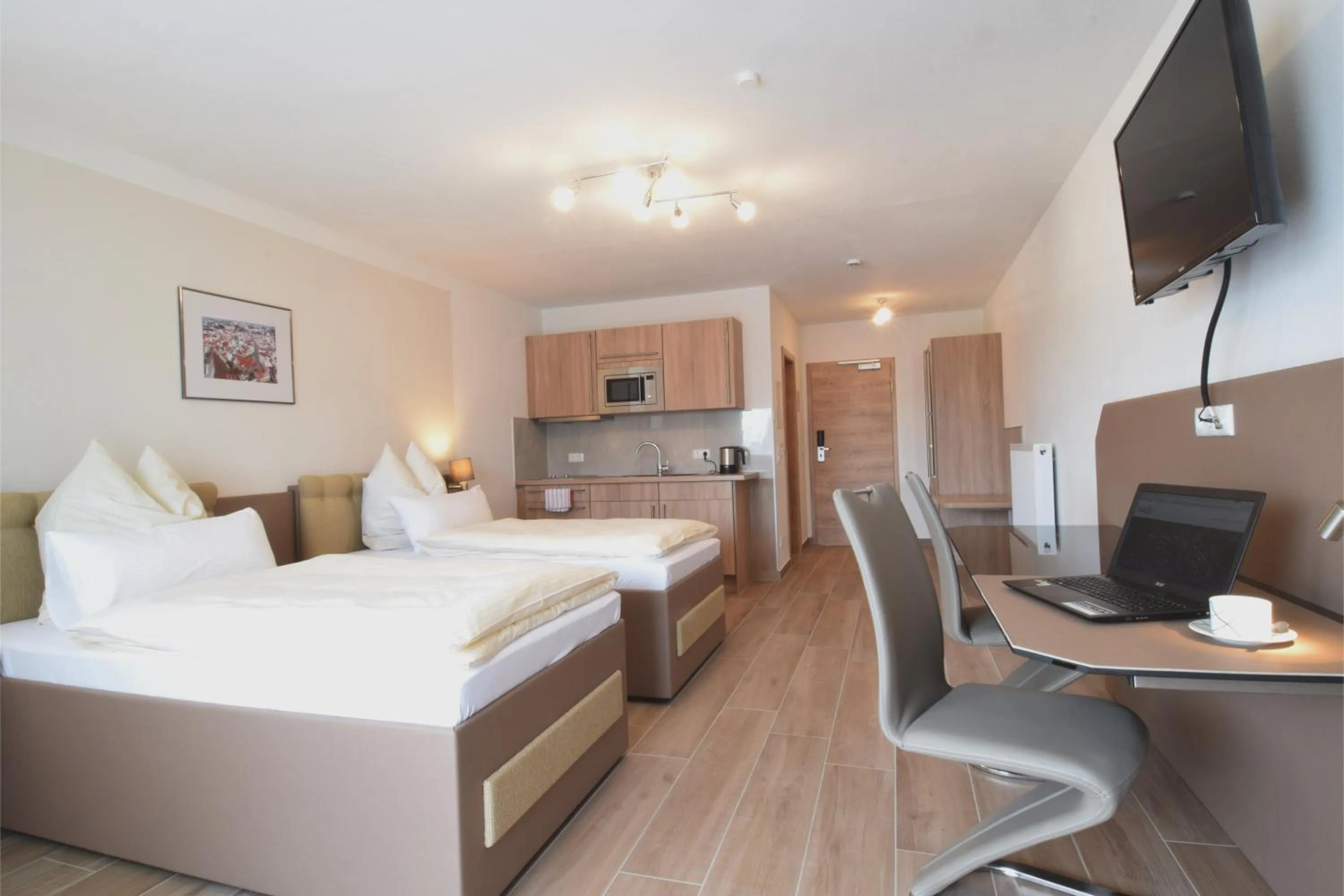 Photo of the whole room, Bed in Aparthotel Donaustern