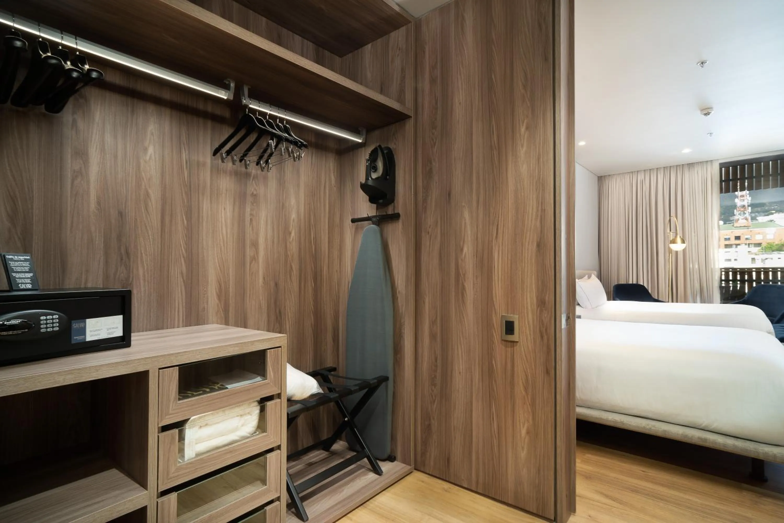 Communal lounge/ TV room, Bed in Salvio Parque 93 Bogota, Curio Collection by Hilton