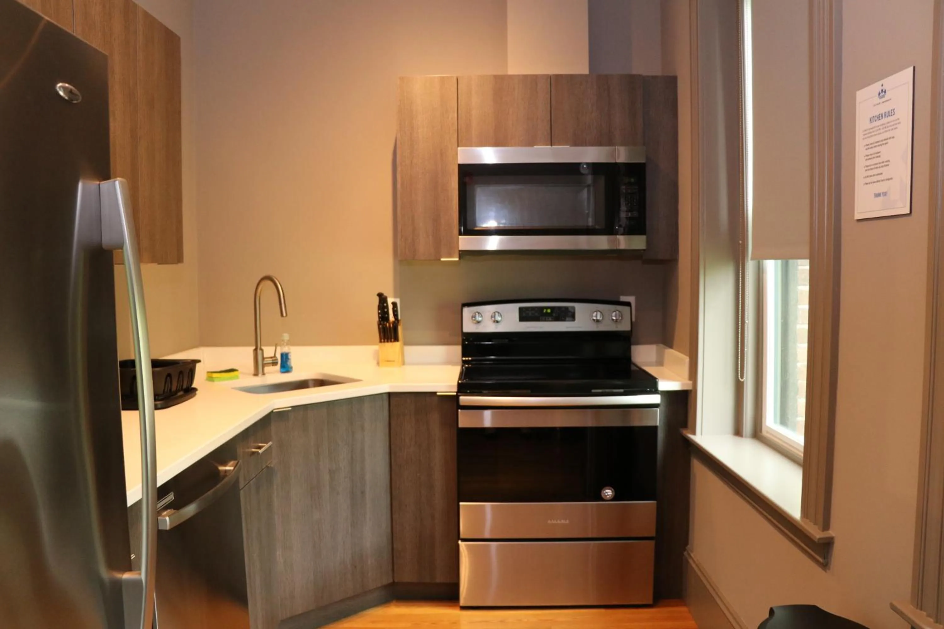 Communal kitchen in A Stylish Stay w/ a Queen Bed, Heated Floors.. #33