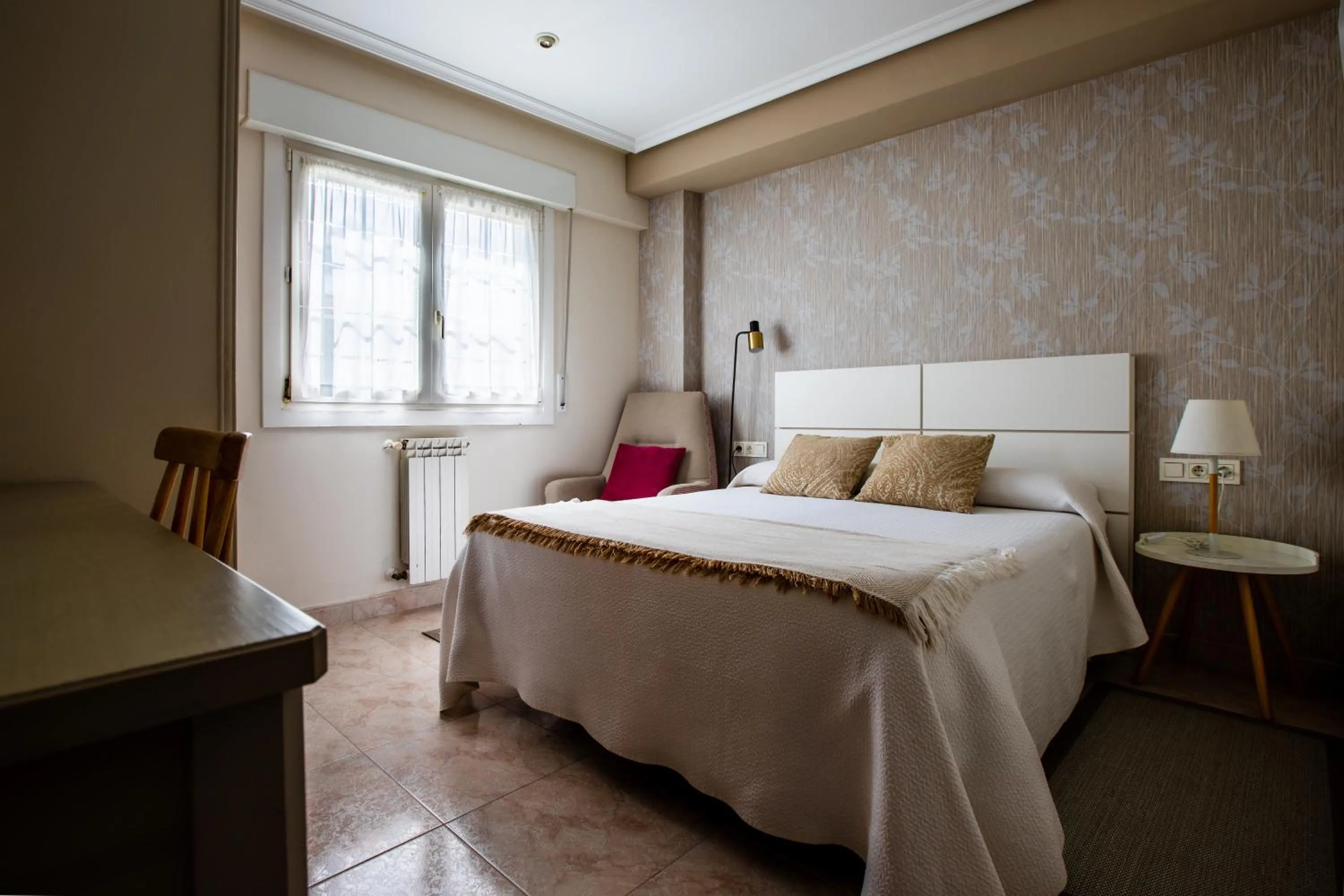 Bed in Pensión Zumardi