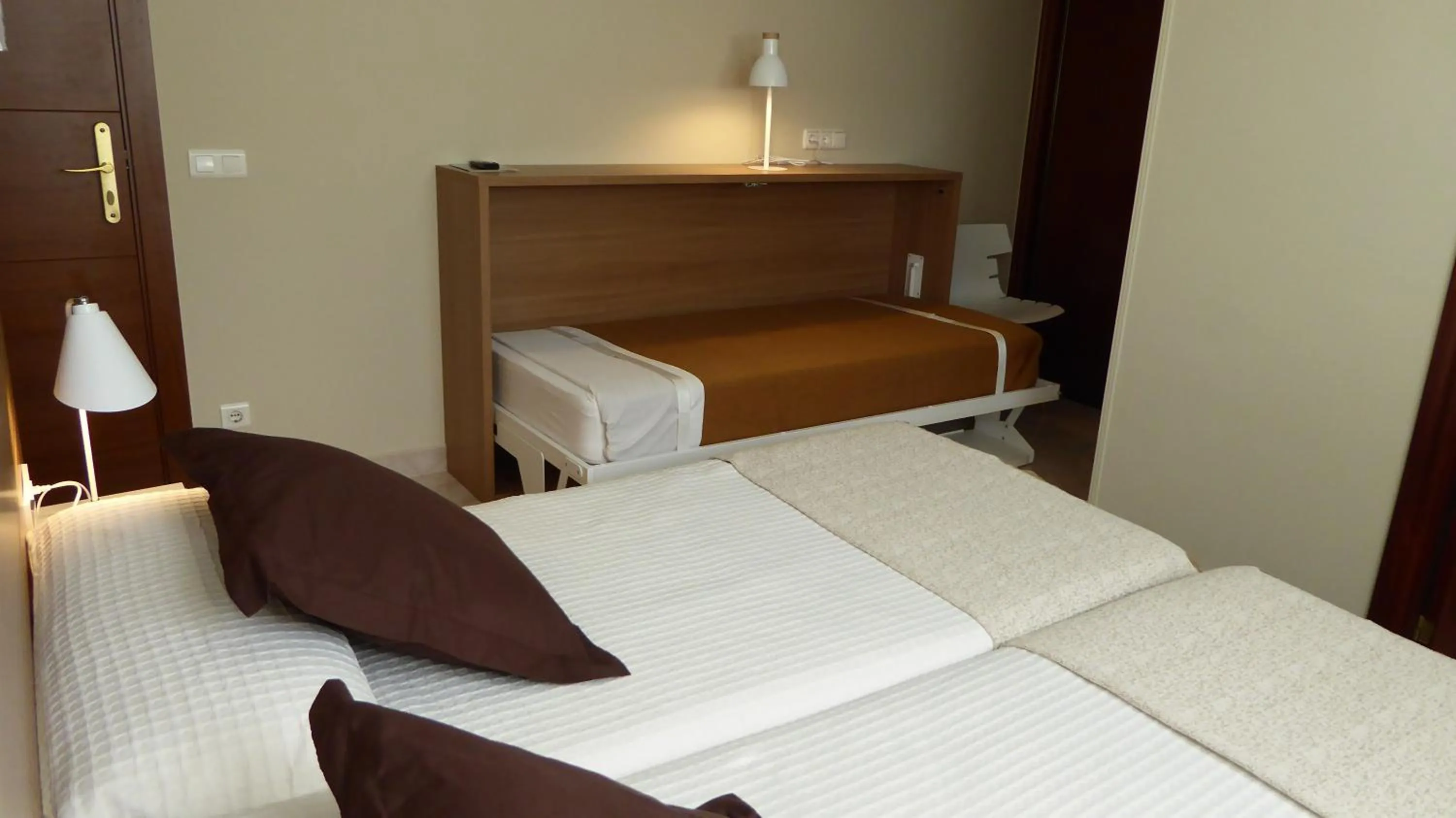 Bed in Pensión Zumardi