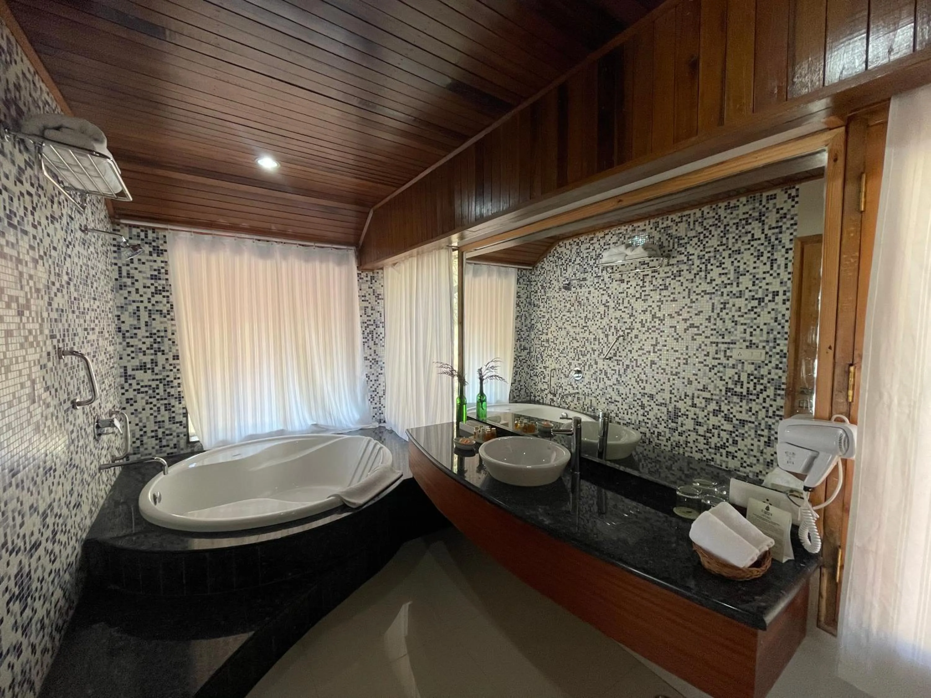 Bathroom in Manuallaya The Resort & Spa