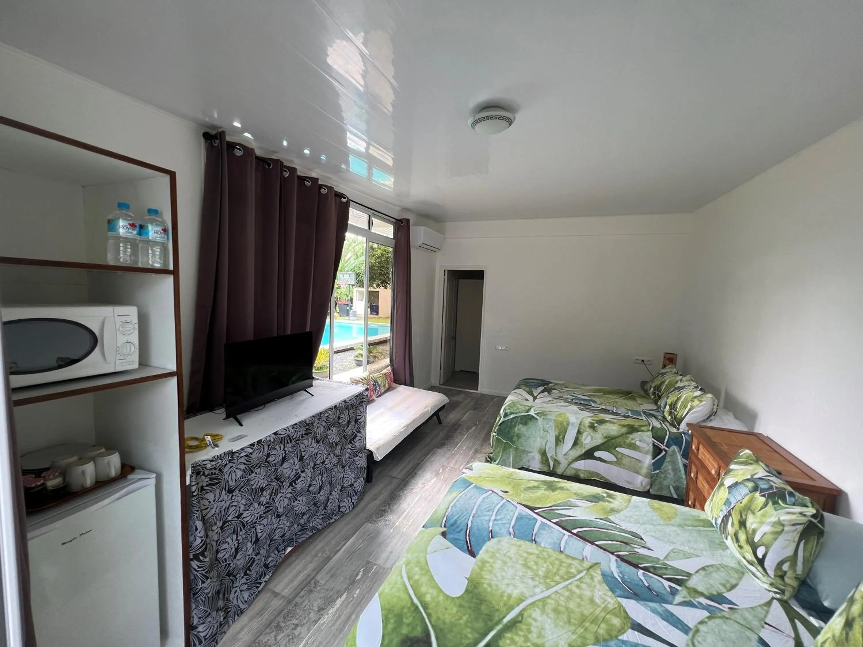 Photo of the whole room, Bed in TEA TAHITI Holidays