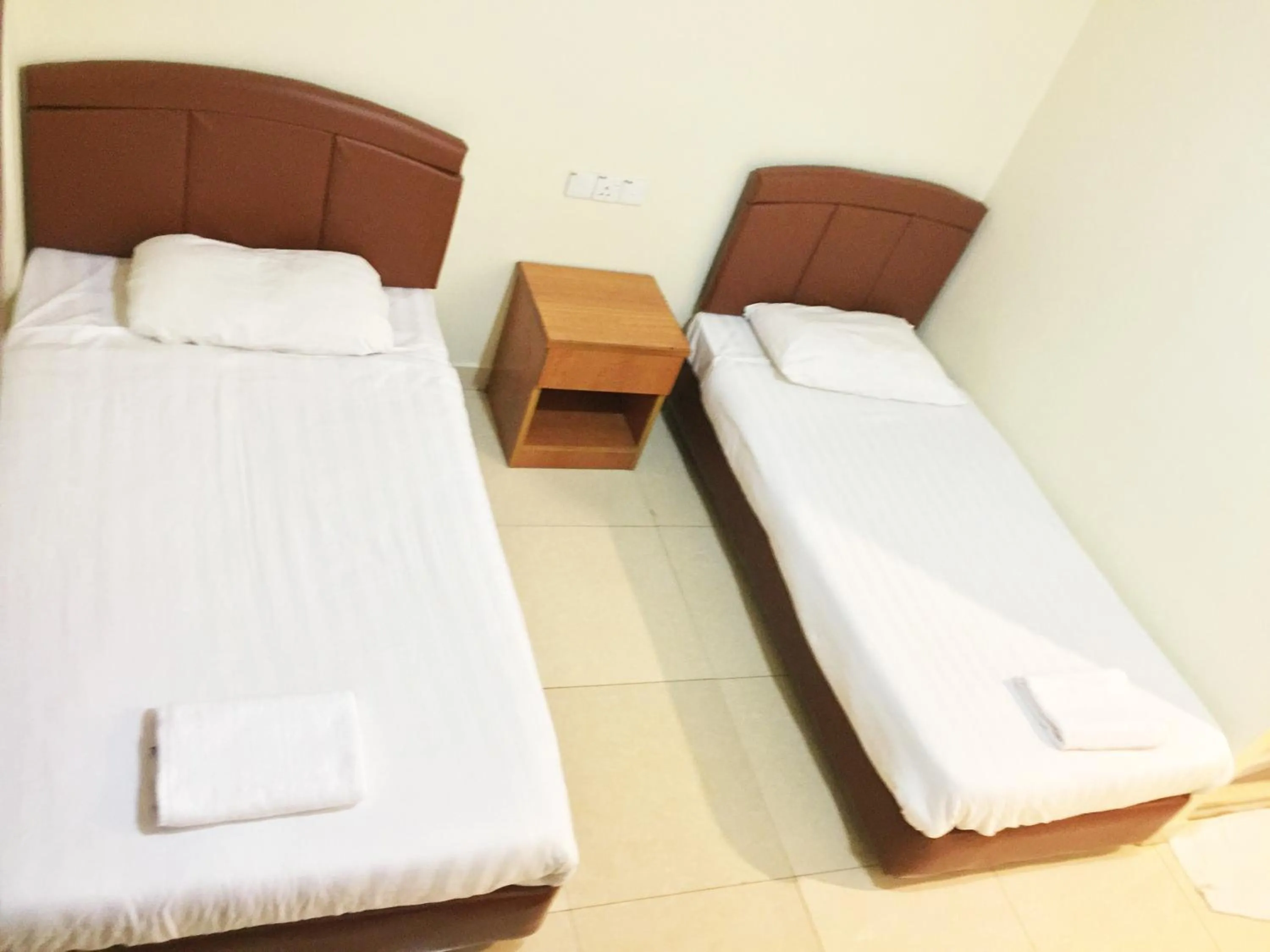 Bed in HK Inn Hua Kiew Inn