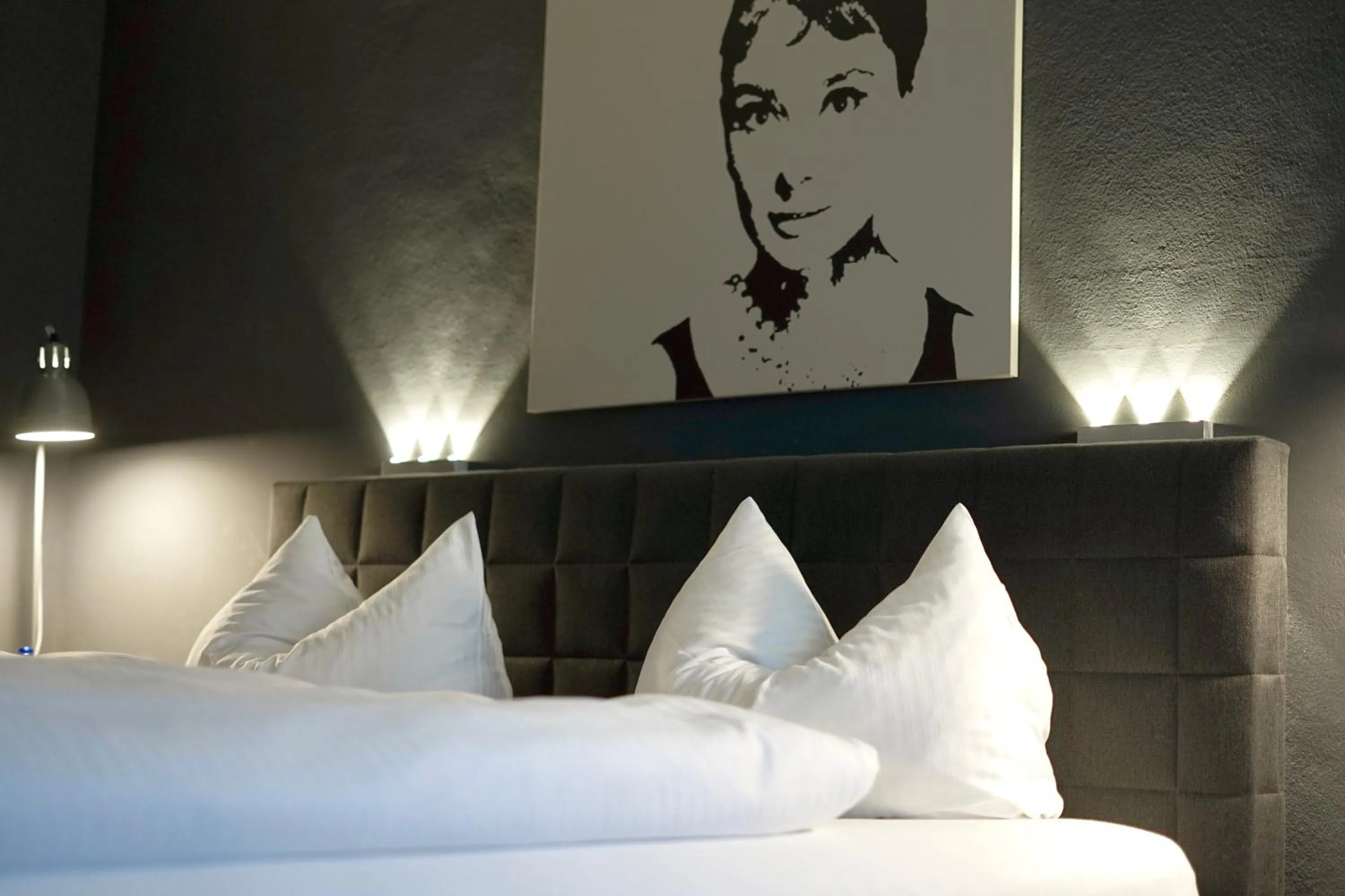 Bed in Hotel Mühldorf