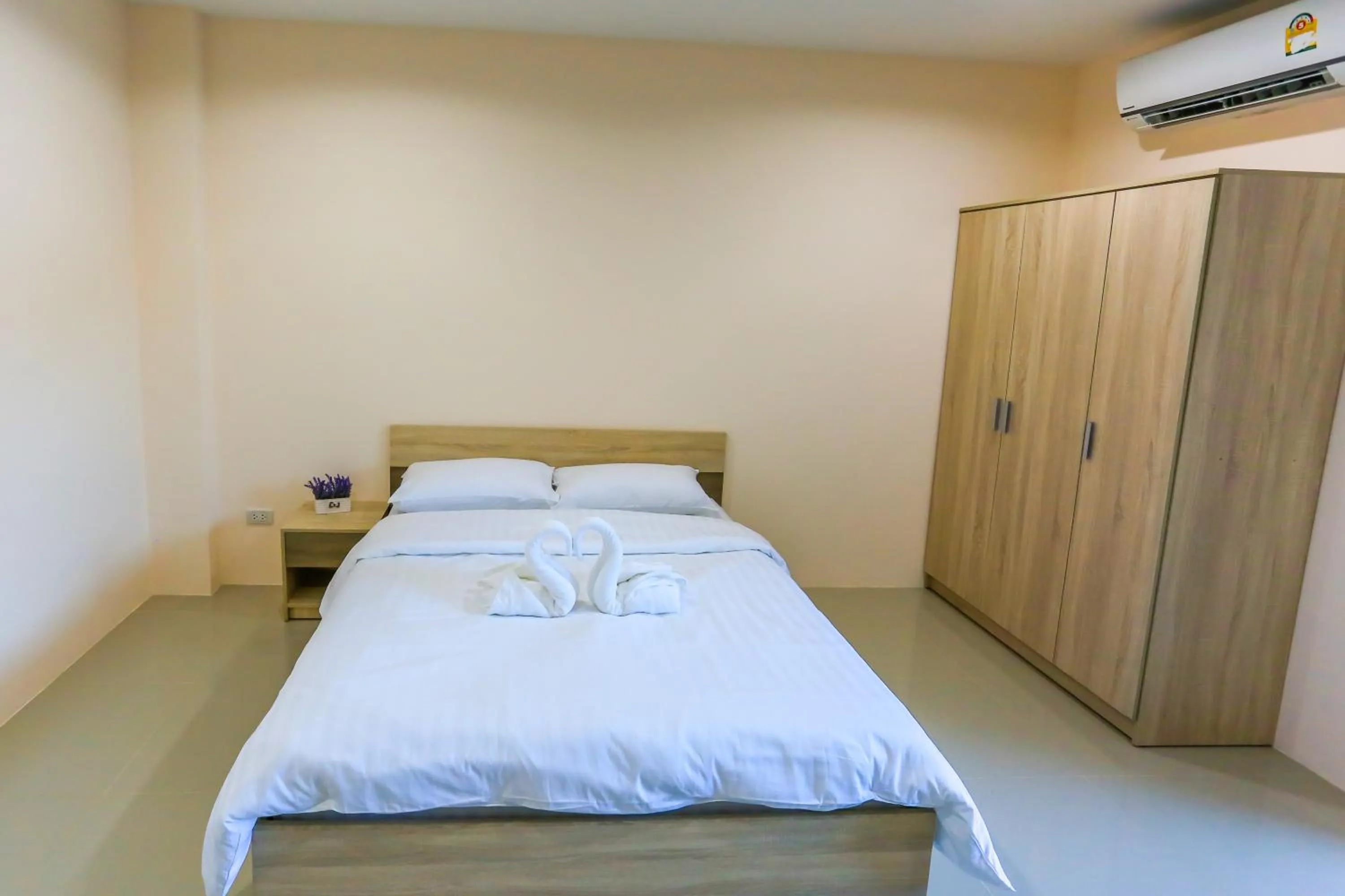 Bed in Tempo Plus Apartment