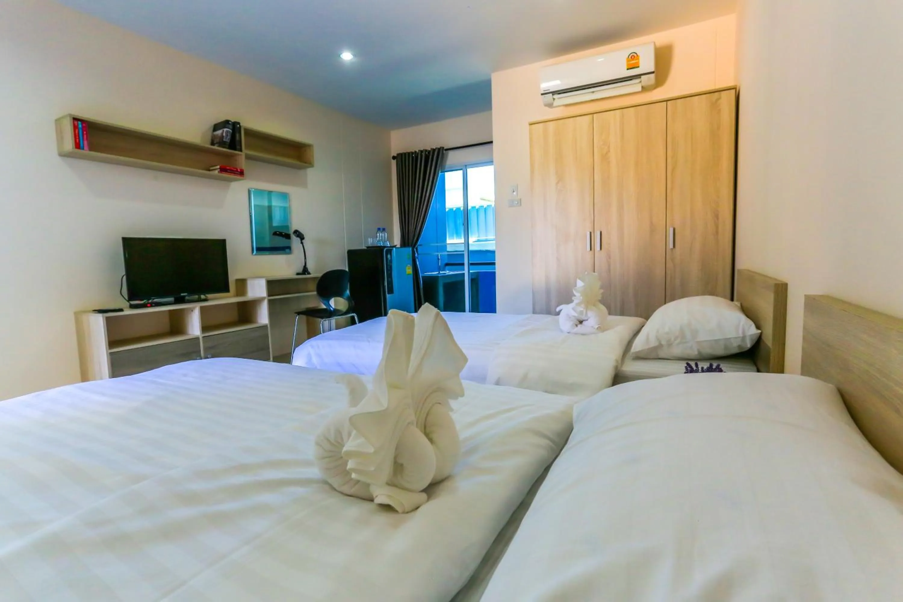 Bed in Tempo Plus Apartment