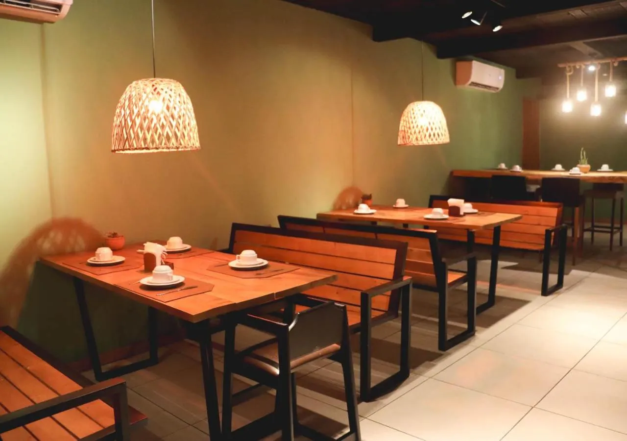 Communal lounge/ TV room in Grão Pará Petrópolis