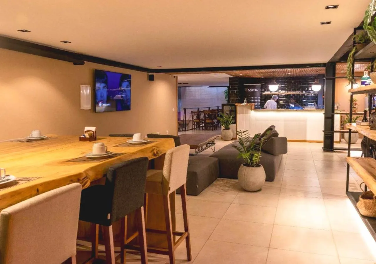 Communal lounge/ TV room in Grão Pará Petrópolis