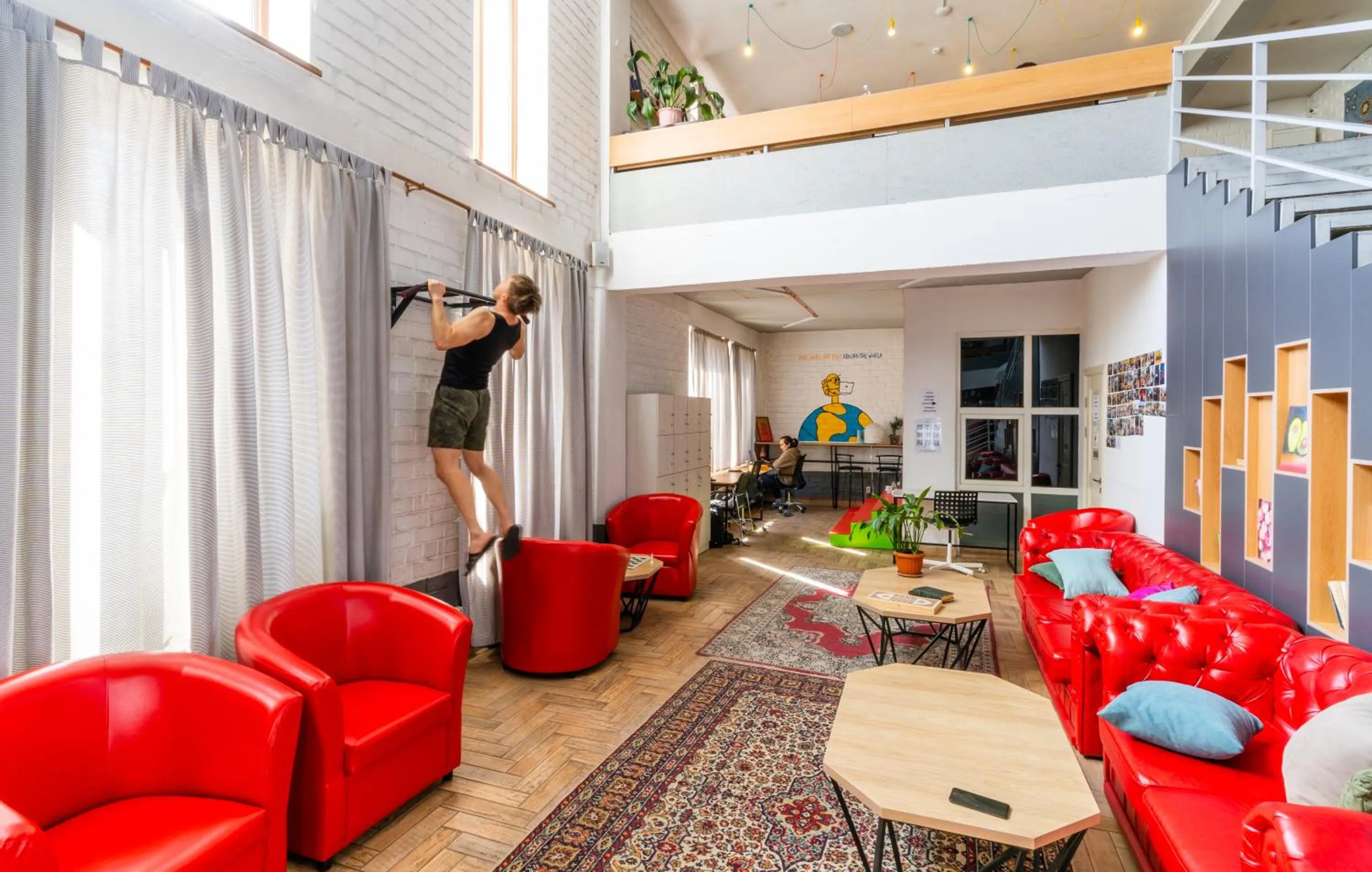 Communal lounge/ TV room in ololoFreelander Hostel&Coworking