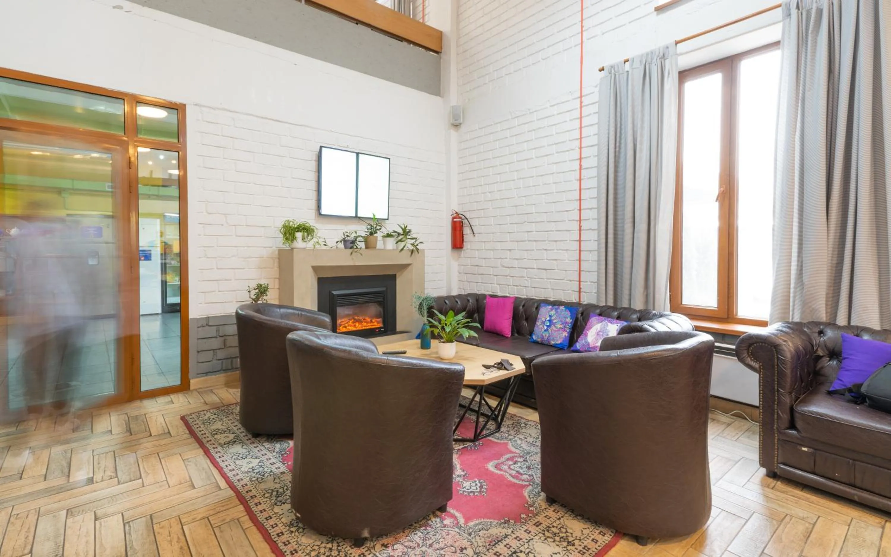 Communal lounge/ TV room in ololoFreelander Hostel&Coworking