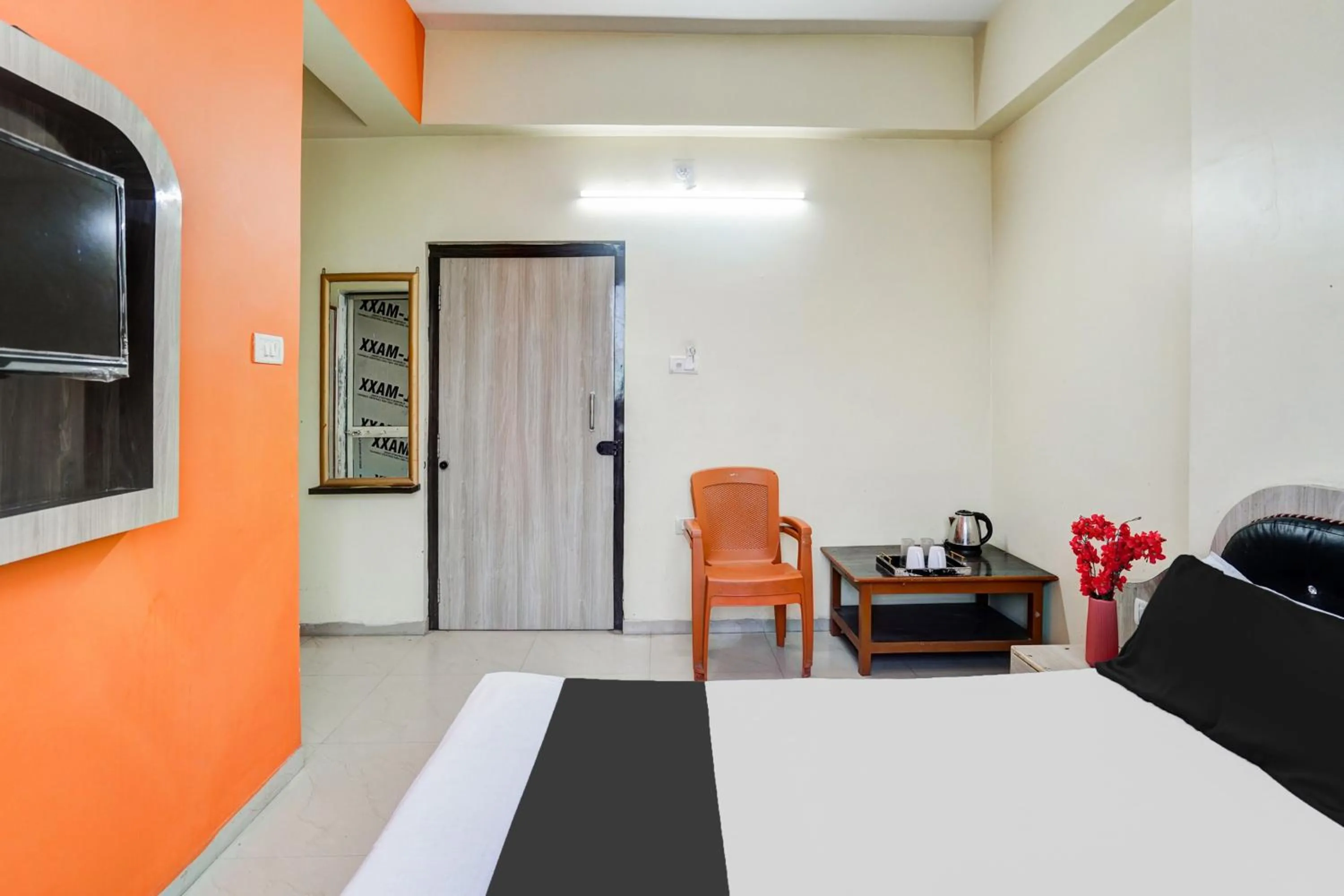 Bedroom in Super Hotel O Darbhanga Near Khanka Chowk