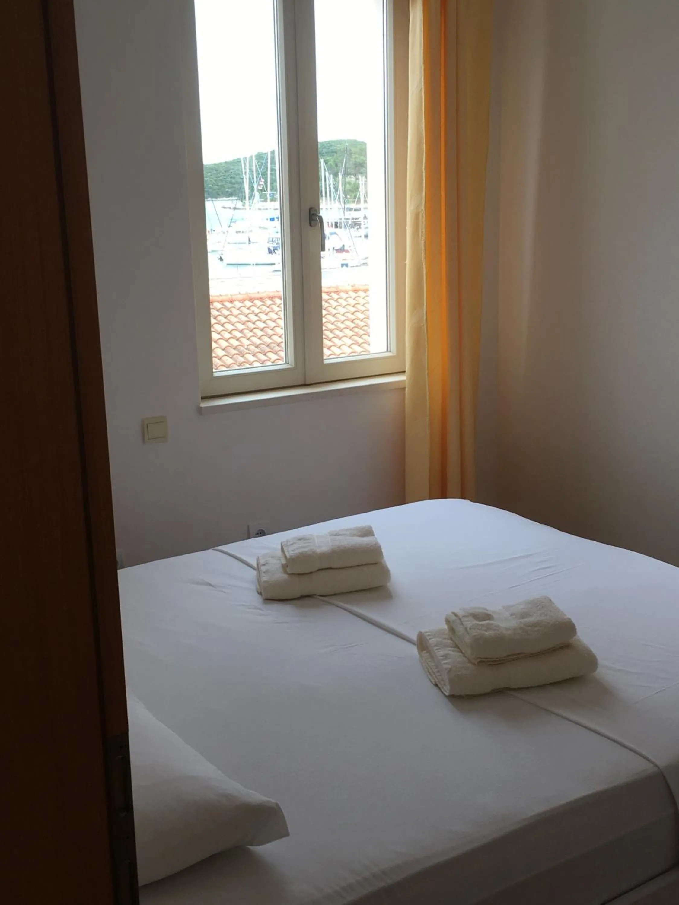 Bed in Apartments and Rooms Katija & Egon