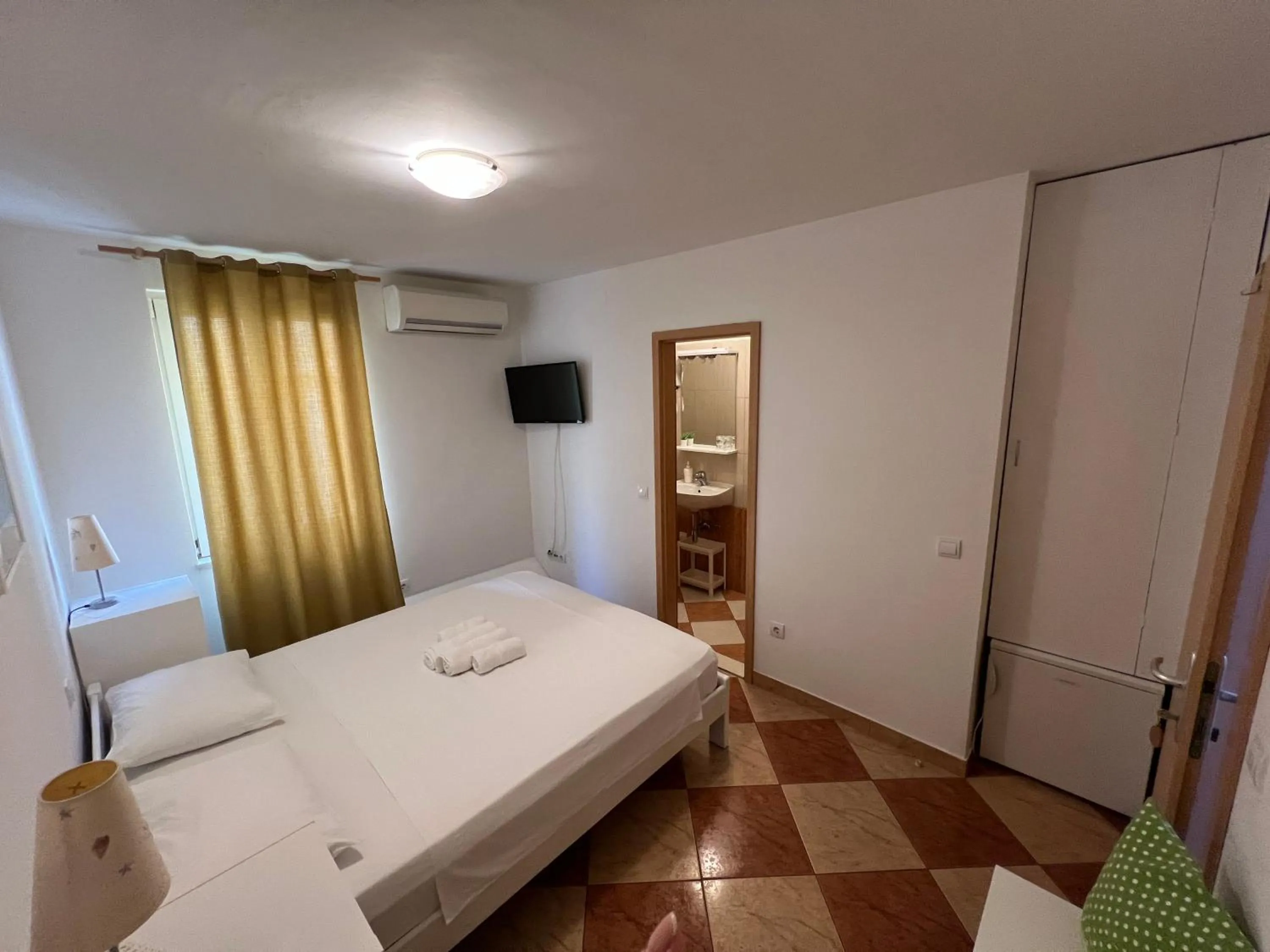 Bed in Apartments and Rooms Katija & Egon