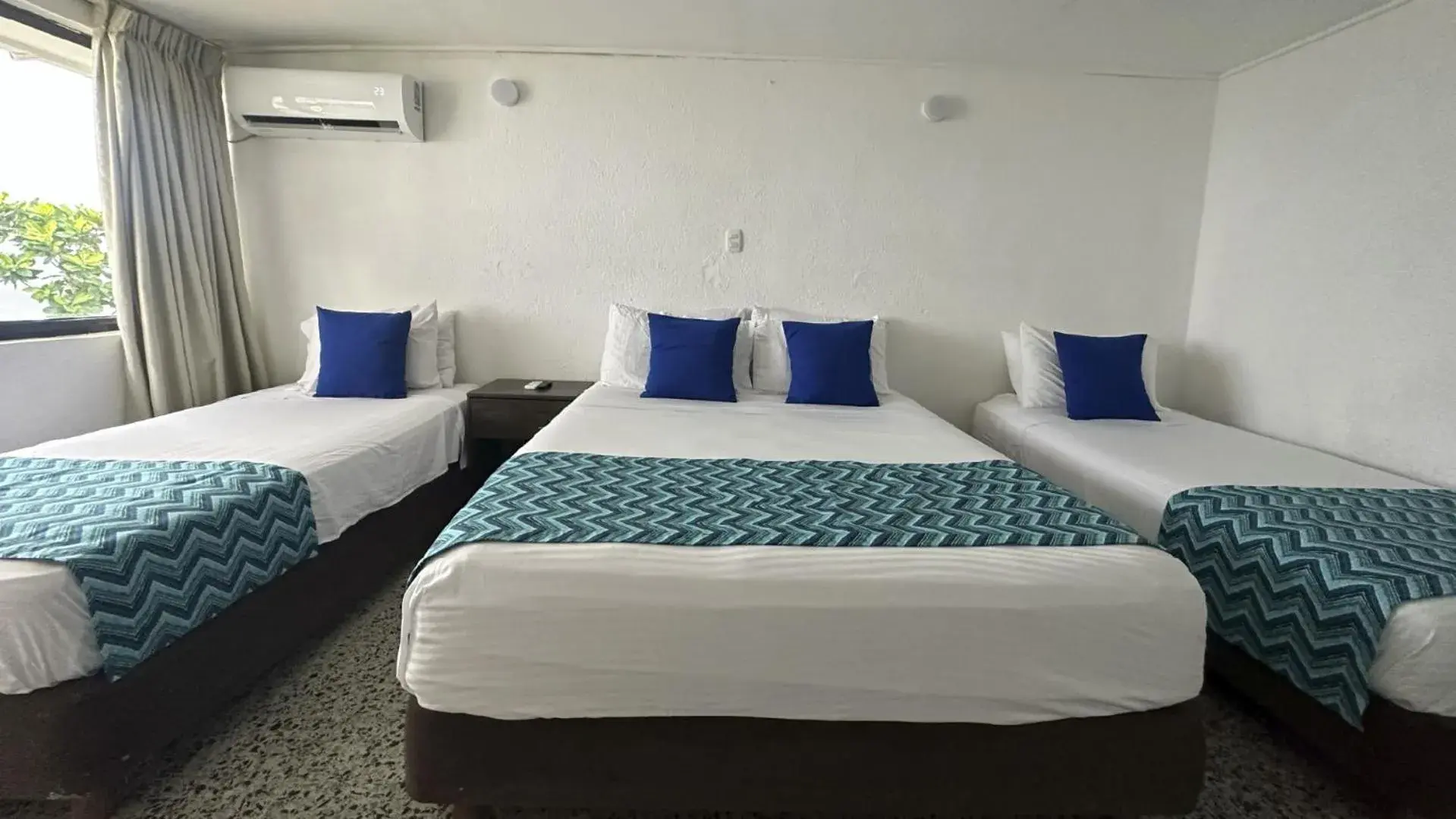 Bed in Hotel Blue Reef by On vacation Bed in Hotel Blue Reef by On vacation
