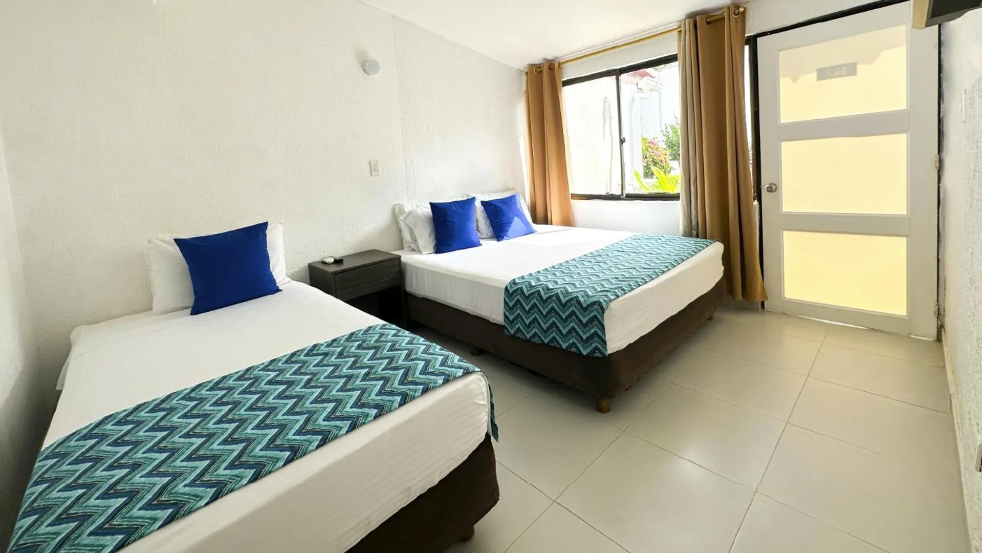 Bed in Hotel Blue Reef by On vacation