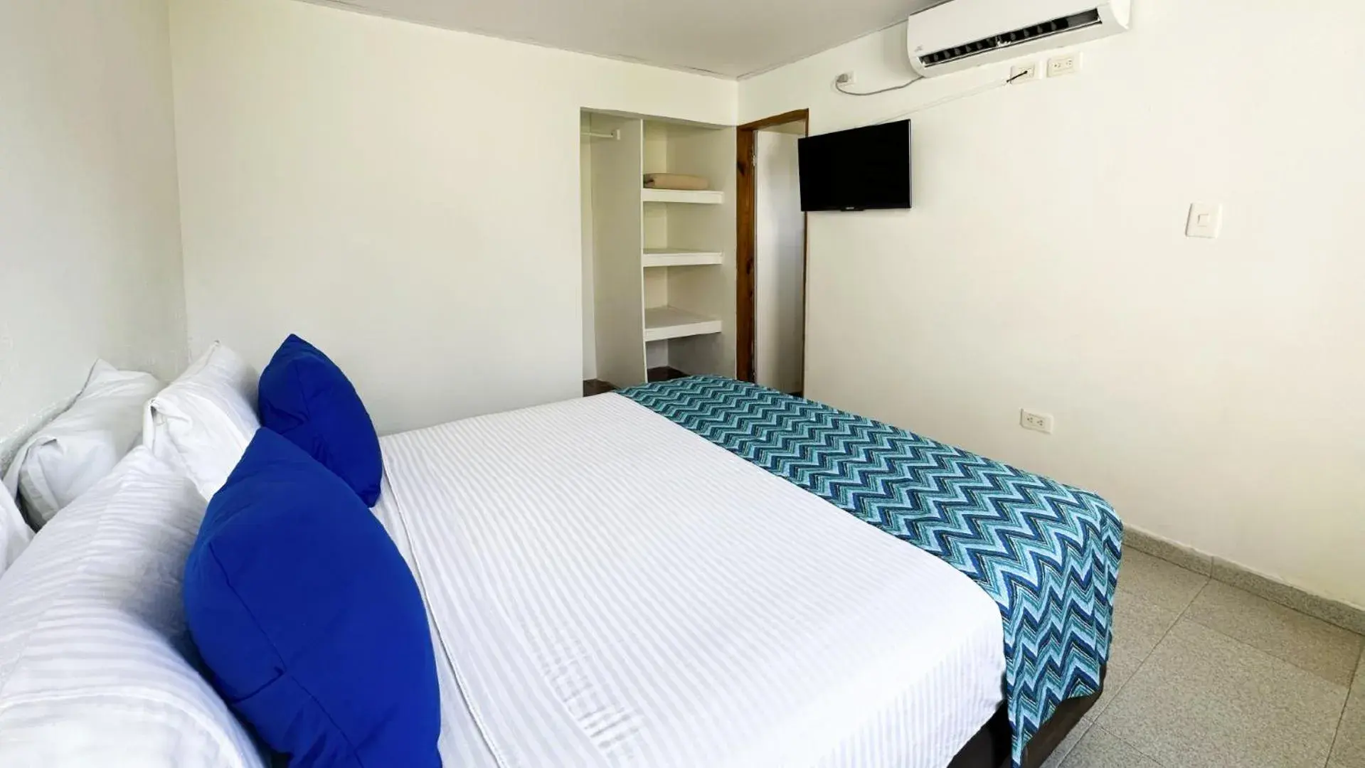 Bed in Hotel Blue Reef by On vacation Bed in Hotel Blue Reef by On vacation