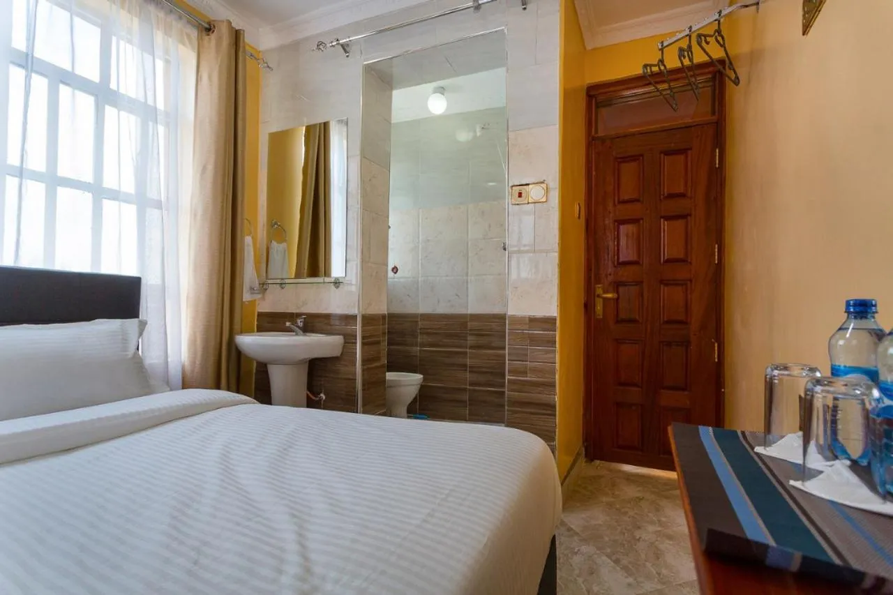 Photo of the whole room, Bed in Kentania Hotel & Spa, Nakuru - Kenya