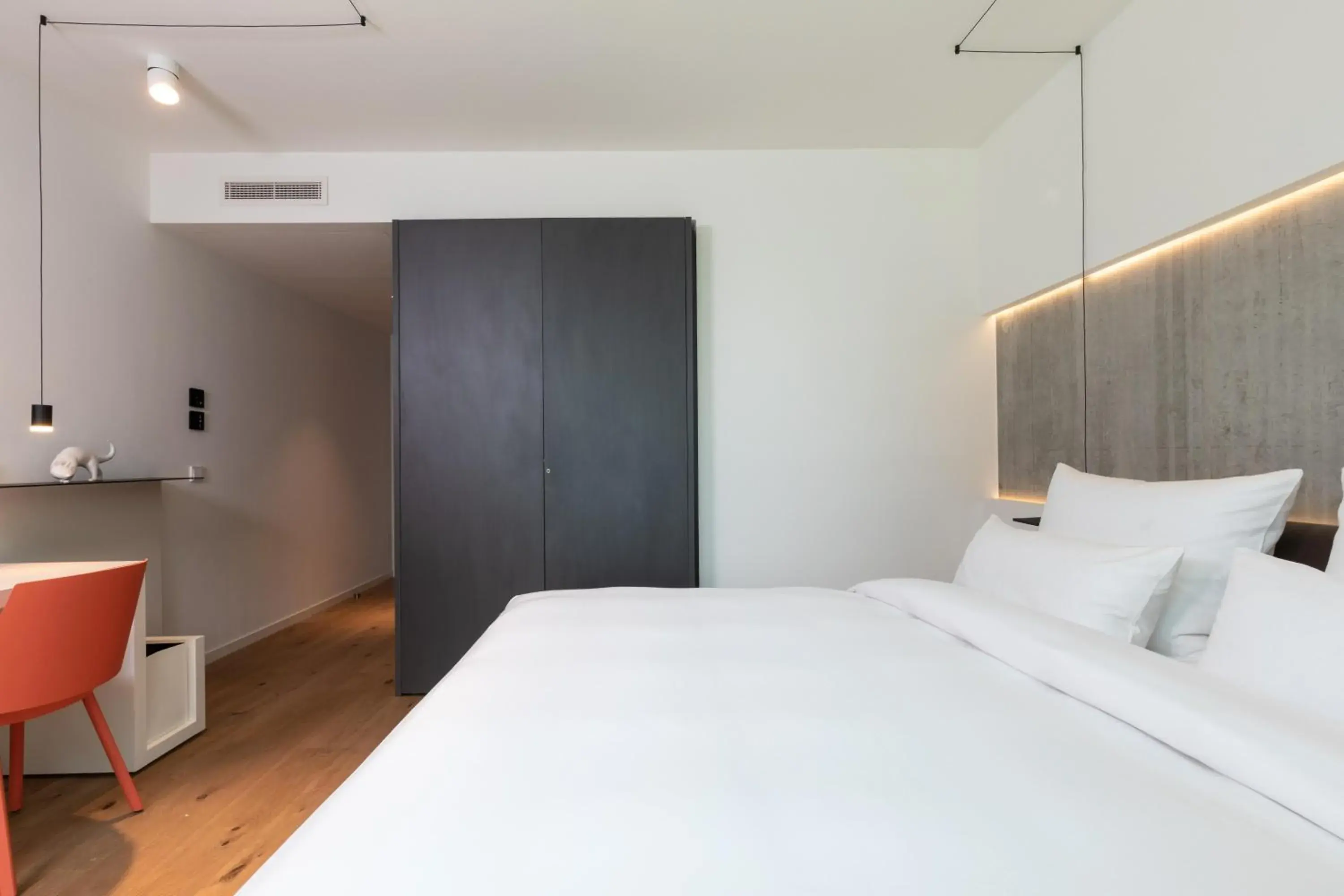 Bed in KPM Hotel & Residences Berlin, a Member of Design Hotels Bed in KPM Hotel & Residences Berlin, a Member of Design Hotels