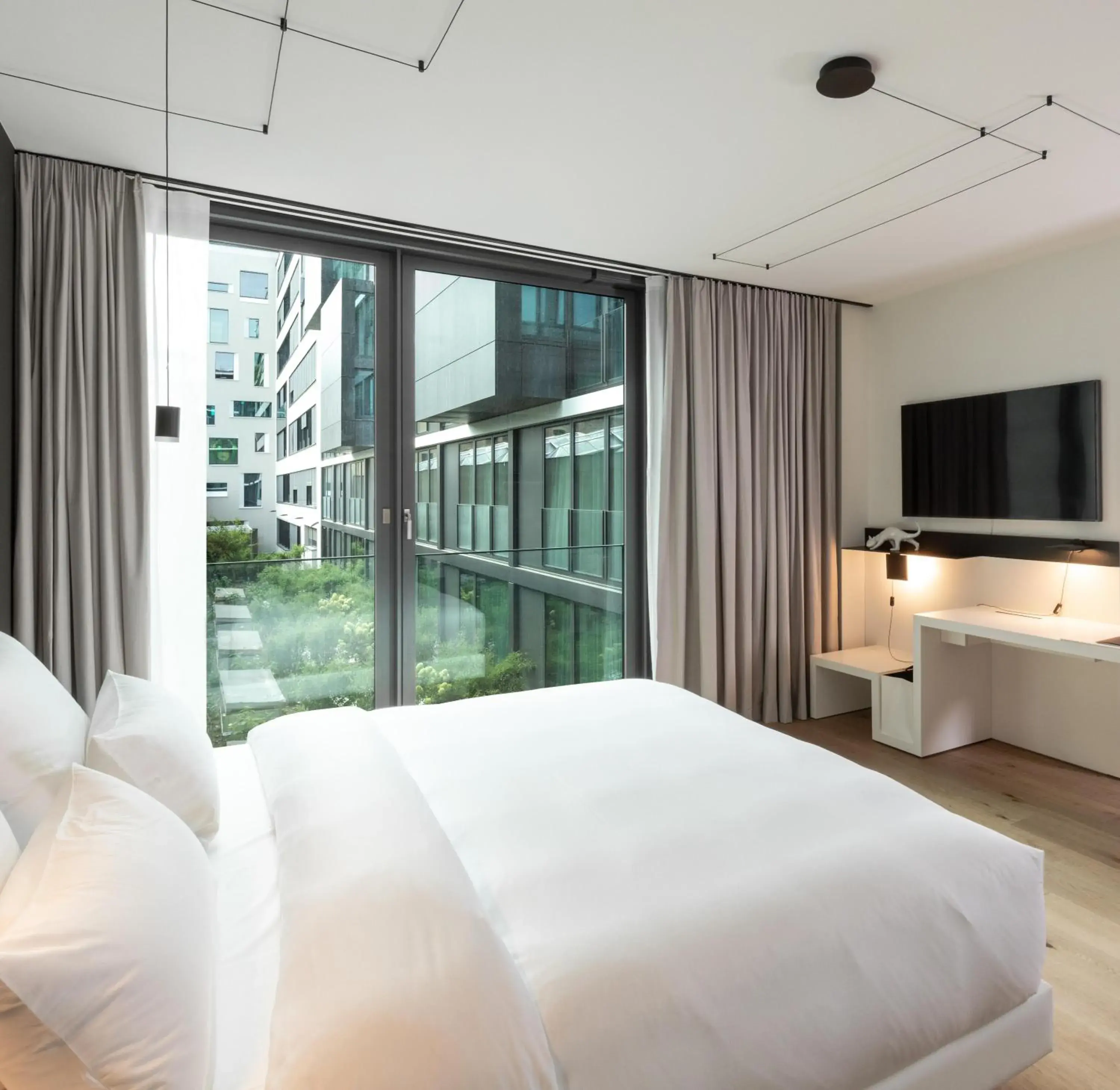 Bed in KPM Hotel & Residences Berlin, a Member of Design Hotels Bed in KPM Hotel & Residences Berlin, a Member of Design Hotels