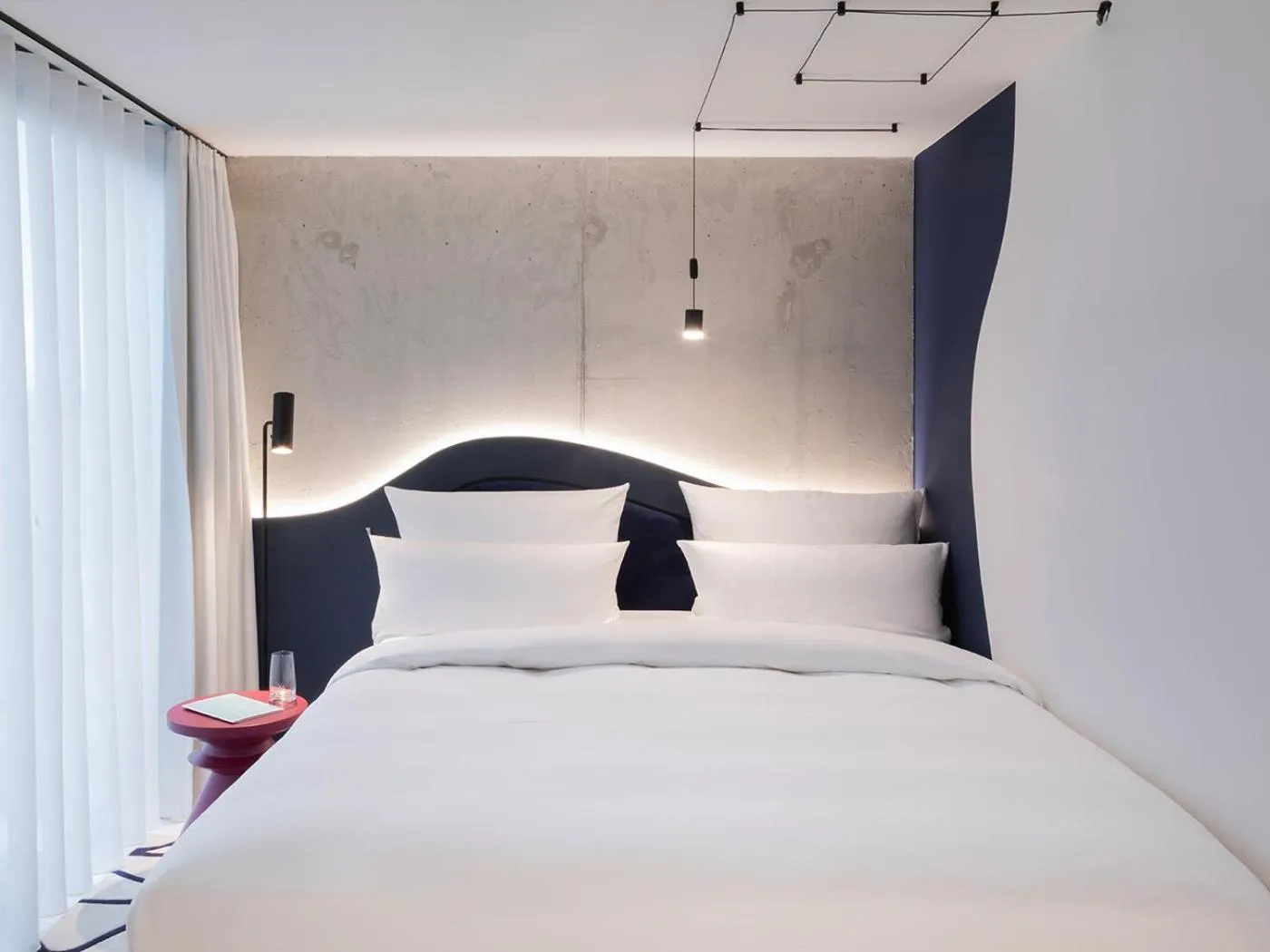 Bed in KPM Hotel & Residences Berlin, a Member of Design Hotels