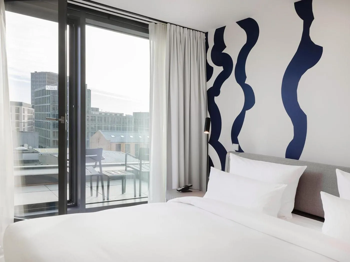 Balcony/Terrace, Bed in KPM Hotel & Residences Berlin, a Member of Design Hotels