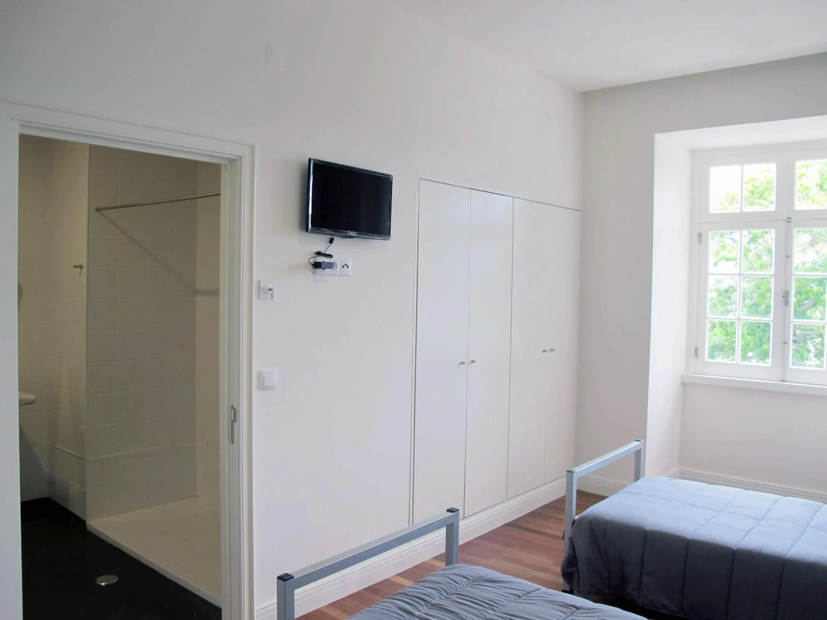 Bathroom, Bed in Azores Youth Hostels - Sao Miguel